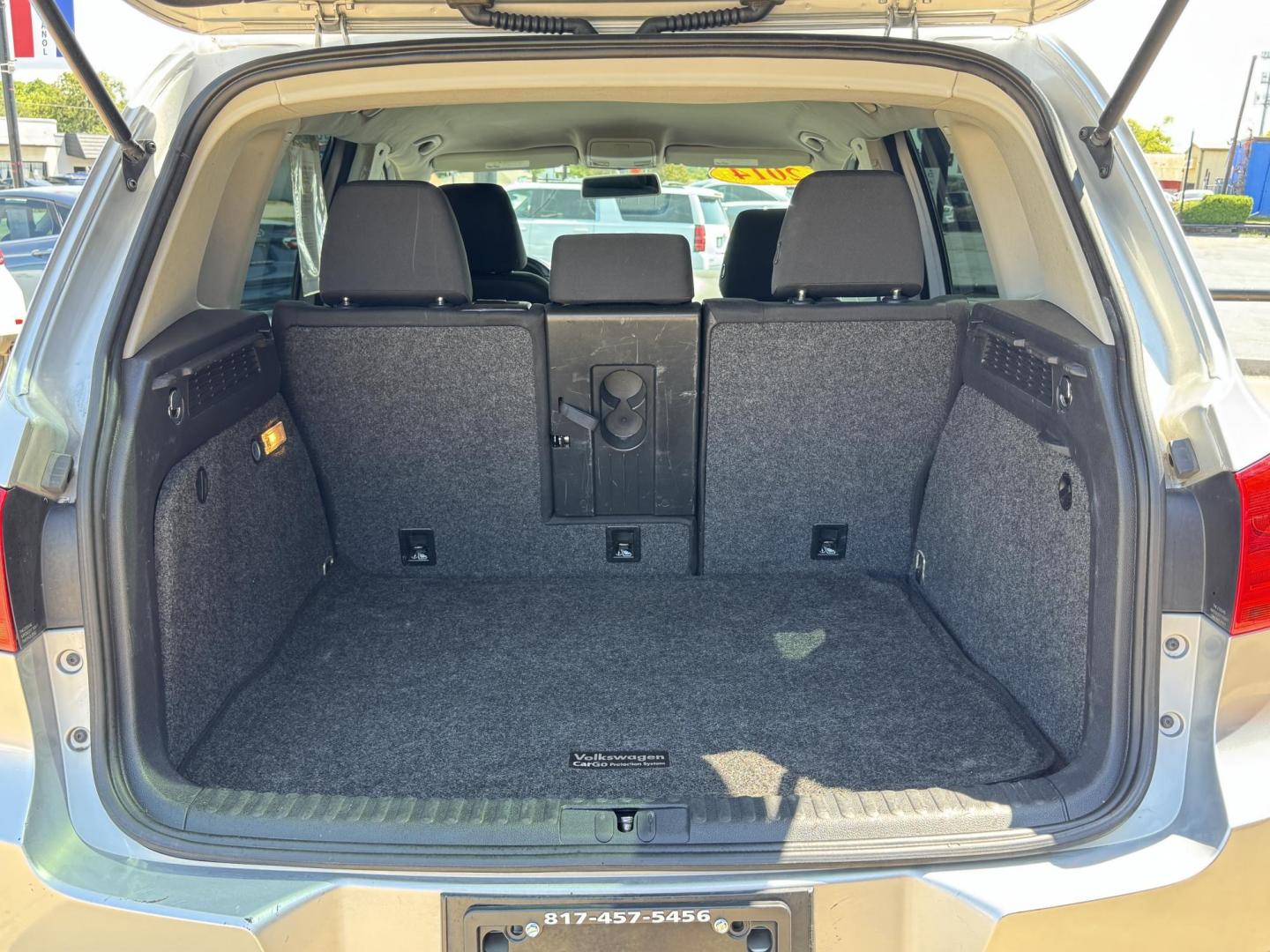2014 SILVER /BLACK VOLKSWAGEN TIGUAN S; SE; SEL; W S (WVGAV3AX2EW) with an 2.0L Turbocharged 4-Cylinder engine, 6-Speed Automatic transmission, located at 5900 E. Lancaster Ave., Fort Worth, TX, 76112, (817) 457-5456, 0.000000, 0.000000 - Sporty and versatile, this Tiguan features a 2.0L turbocharged engine, seating for 5 passengers, and up to 23.8 cu. ft. of cargo space. Enjoy features like black cloth interior, power locks, ABS, and stability control—a compact SUV with German engineering, efficiency, and comfort all in one. - Photo#5