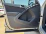 2014 SILVER /BLACK VOLKSWAGEN TIGUAN S; SE; SEL; W S (WVGAV3AX2EW) with an 2.0L Turbocharged 4-Cylinder engine, 6-Speed Automatic transmission, located at 5900 E. Lancaster Ave., Fort Worth, TX, 76112, (817) 457-5456, 0.000000, 0.000000 - Sporty and versatile, this Tiguan features a 2.0L turbocharged engine, seating for 5 passengers, and up to 23.8 cu. ft. of cargo space. Enjoy features like black cloth interior, power locks, ABS, and stability control—a compact SUV with German engineering, efficiency, and comfort all in one. - Photo#7