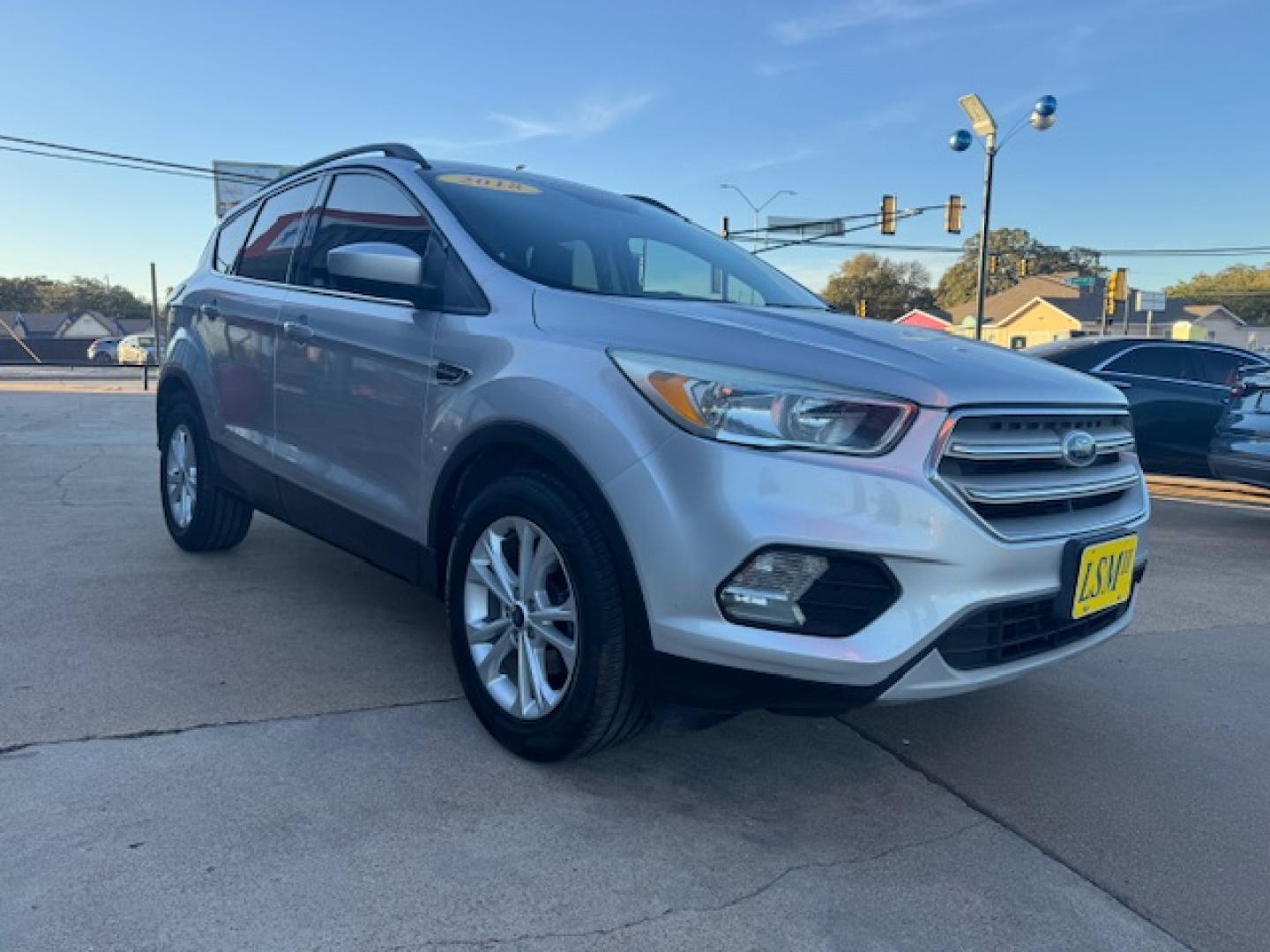 2014 SILVER /BLACK VOLKSWAGEN TIGUAN S; SE; SEL; W S (WVGAV3AX2EW) with an 2.0L engine, 6-Speed Automatic transmission, located at 5900 E. Lancaster Ave., Fort Worth, TX, 76112, (817) 457-5456, 0.000000, 0.000000 - Sporty and versatile, this Tiguan features a 2.0L turbocharged engine, seating for 5 passengers, and up to 23.8 cu. ft. of cargo space. Enjoy features like black cloth interior, power locks, ABS, and stability control—a compact SUV with German engineering, efficiency, and comfort all in one. - Photo#2