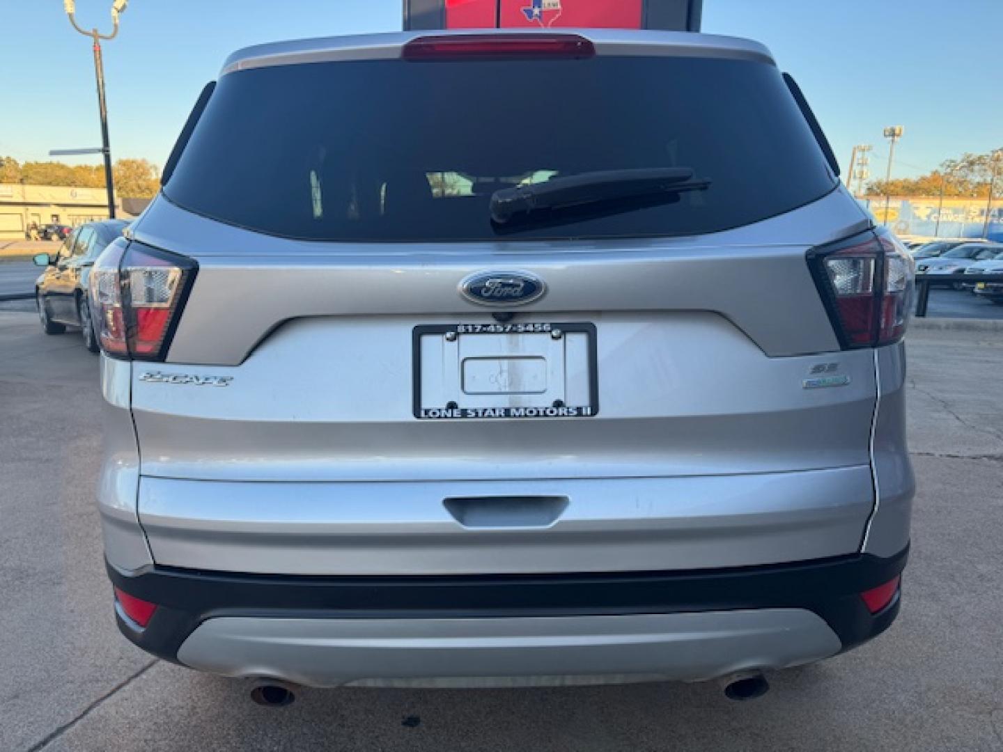 2014 SILVER /BLACK VOLKSWAGEN TIGUAN S; SE; SEL; W S (WVGAV3AX2EW) with an 2.0L engine, 6-Speed Automatic transmission, located at 5900 E. Lancaster Ave., Fort Worth, TX, 76112, (817) 457-5456, 0.000000, 0.000000 - Sporty and versatile, this Tiguan features a 2.0L turbocharged engine, seating for 5 passengers, and up to 23.8 cu. ft. of cargo space. Enjoy features like black cloth interior, power locks, ABS, and stability control—a compact SUV with German engineering, efficiency, and comfort all in one. - Photo#4