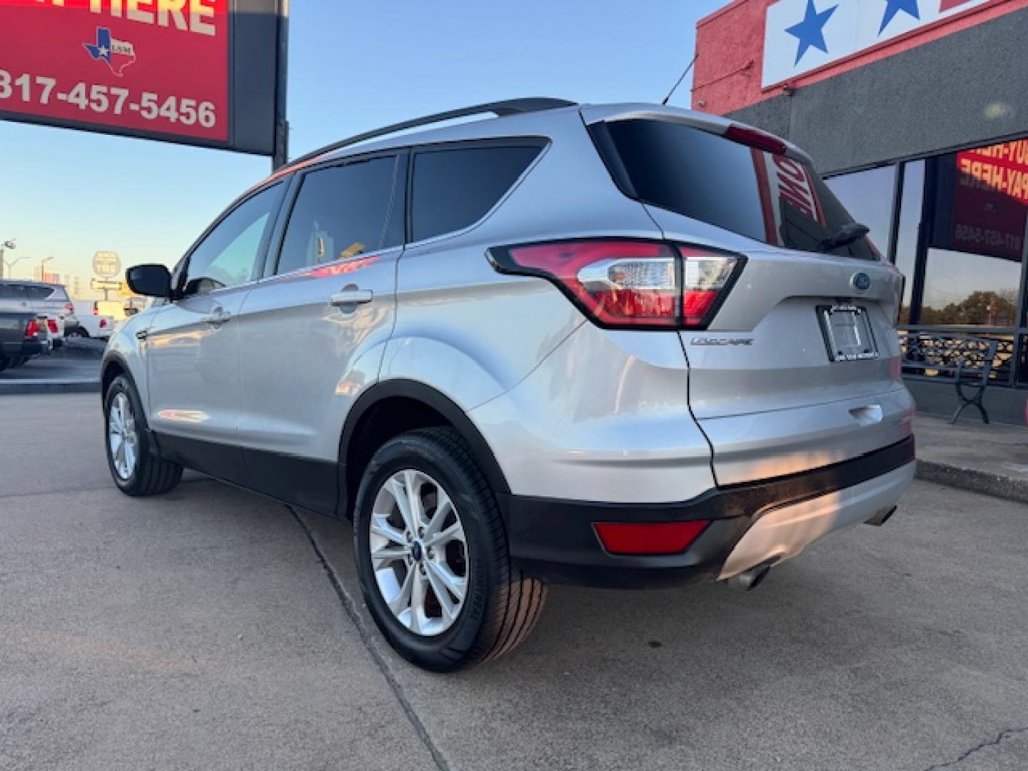 2014 SILVER /BLACK VOLKSWAGEN TIGUAN S; SE; SEL; W S (WVGAV3AX2EW) with an 2.0L engine, 6-Speed Automatic transmission, located at 5900 E. Lancaster Ave., Fort Worth, TX, 76112, (817) 457-5456, 0.000000, 0.000000 - Sporty and versatile, this Tiguan features a 2.0L turbocharged engine, seating for 5 passengers, and up to 23.8 cu. ft. of cargo space. Enjoy features like black cloth interior, power locks, ABS, and stability control—a compact SUV with German engineering, efficiency, and comfort all in one. - Photo#6