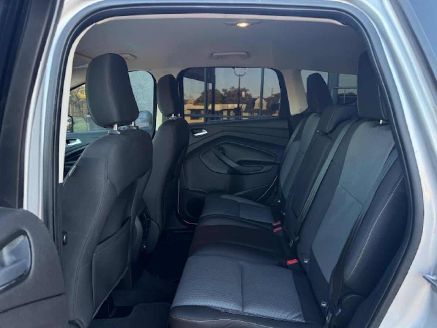 2014 SILVER /BLACK VOLKSWAGEN TIGUAN S; SE; SEL; W S (WVGAV3AX2EW) with an 2.0L engine, 6-Speed Automatic transmission, located at 5900 E. Lancaster Ave., Fort Worth, TX, 76112, (817) 457-5456, 0.000000, 0.000000 - Sporty and versatile, this Tiguan features a 2.0L turbocharged engine, seating for 5 passengers, and up to 23.8 cu. ft. of cargo space. Enjoy features like black cloth interior, power locks, ABS, and stability control—a compact SUV with German engineering, efficiency, and comfort all in one. - Photo#11