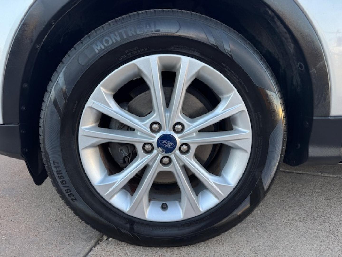 2014 SILVER /BLACK VOLKSWAGEN TIGUAN S; SE; SEL; W S (WVGAV3AX2EW) with an 2.0L engine, 6-Speed Automatic transmission, located at 5900 E. Lancaster Ave., Fort Worth, TX, 76112, (817) 457-5456, 0.000000, 0.000000 - Sporty and versatile, this Tiguan features a 2.0L turbocharged engine, seating for 5 passengers, and up to 23.8 cu. ft. of cargo space. Enjoy features like black cloth interior, power locks, ABS, and stability control—a compact SUV with German engineering, efficiency, and comfort all in one. - Photo#21