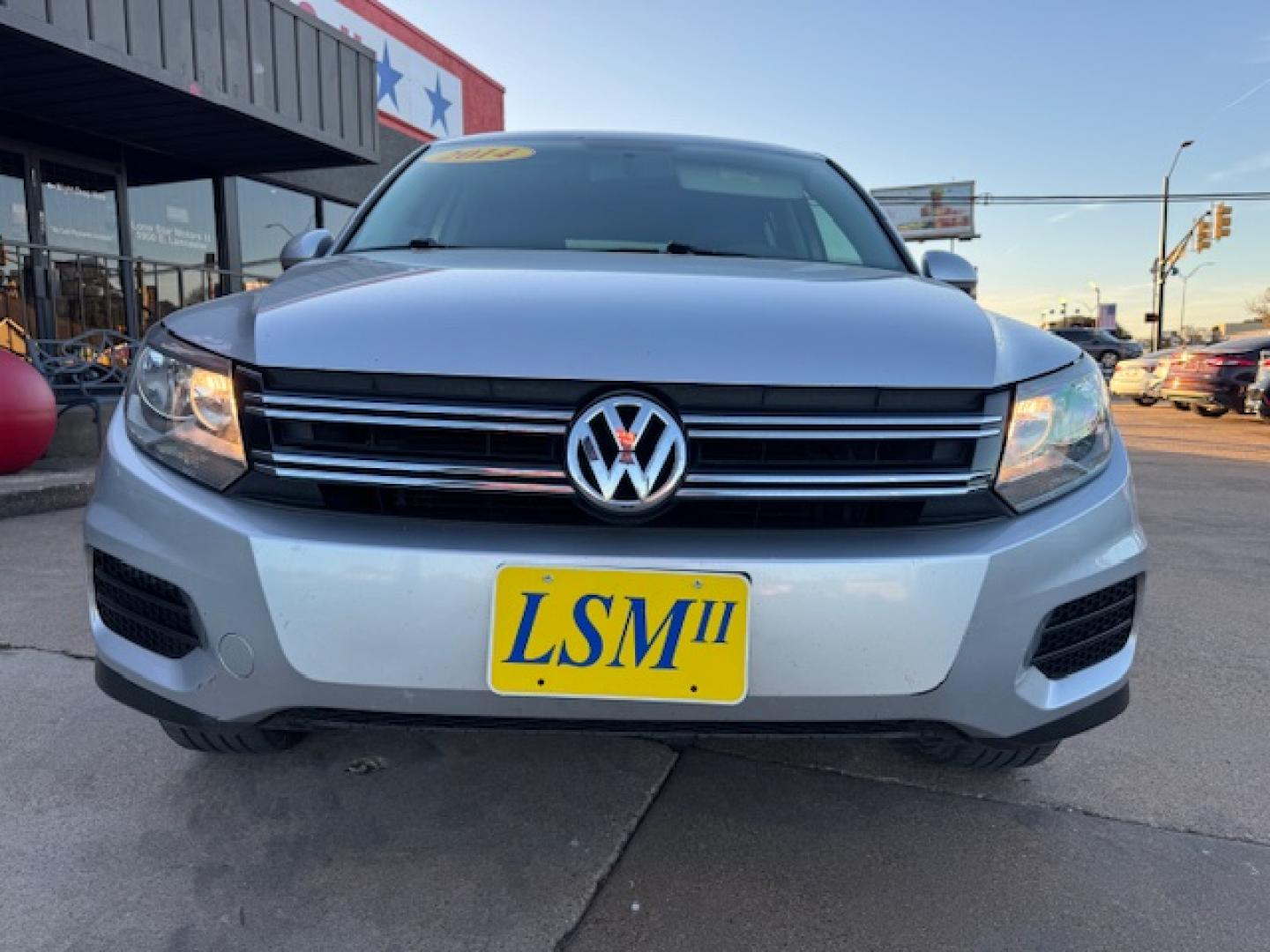 2014 SILVER /BLACK VOLKSWAGEN TIGUAN S; SE; SEL; W S (WVGAV3AX2EW) with an 2.0L engine, 6-Speed Automatic transmission, located at 5900 E. Lancaster Ave., Fort Worth, TX, 76112, (817) 457-5456, 0.000000, 0.000000 - Sporty and versatile, this Tiguan features a 2.0L turbocharged engine, seating for 5 passengers, and up to 23.8 cu. ft. of cargo space. Enjoy features like black cloth interior, power locks, ABS, and stability control—a compact SUV with German engineering, efficiency, and comfort all in one. - Photo#24