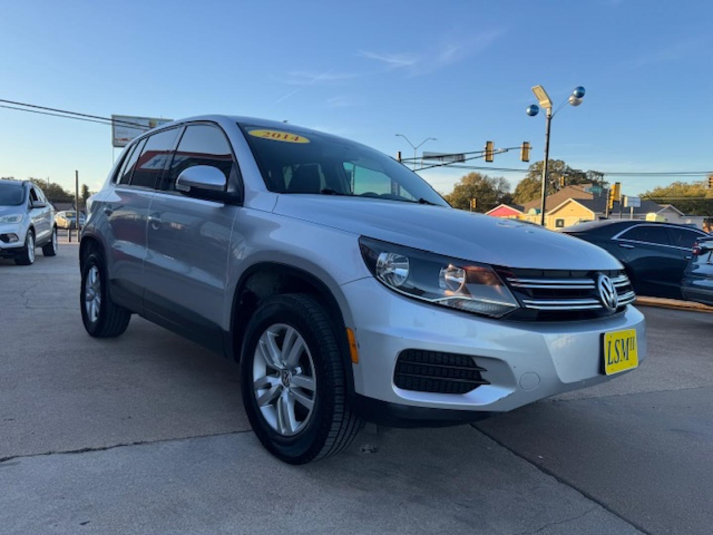 2014 SILVER /BLACK VOLKSWAGEN TIGUAN S; SE; SEL; W S (WVGAV3AX2EW) with an 2.0L engine, 6-Speed Automatic transmission, located at 5900 E. Lancaster Ave., Fort Worth, TX, 76112, (817) 457-5456, 0.000000, 0.000000 - Sporty and versatile, this Tiguan features a 2.0L turbocharged engine, seating for 5 passengers, and up to 23.8 cu. ft. of cargo space. Enjoy features like black cloth interior, power locks, ABS, and stability control—a compact SUV with German engineering, efficiency, and comfort all in one. - Photo#25