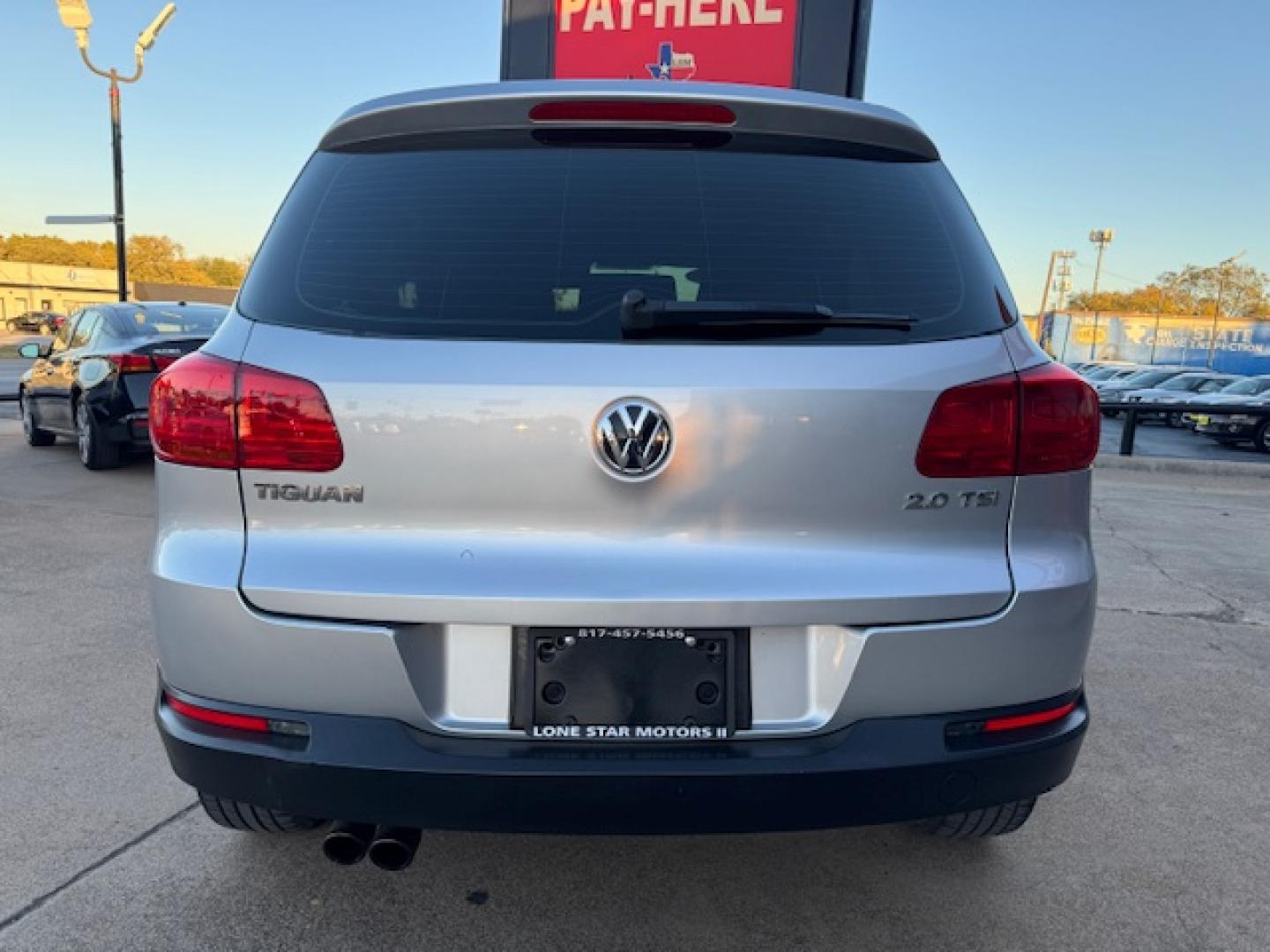 2014 SILVER /BLACK VOLKSWAGEN TIGUAN S; SE; SEL; W S (WVGAV3AX2EW) with an 2.0L engine, 6-Speed Automatic transmission, located at 5900 E. Lancaster Ave., Fort Worth, TX, 76112, (817) 457-5456, 0.000000, 0.000000 - Sporty and versatile, this Tiguan features a 2.0L turbocharged engine, seating for 5 passengers, and up to 23.8 cu. ft. of cargo space. Enjoy features like black cloth interior, power locks, ABS, and stability control—a compact SUV with German engineering, efficiency, and comfort all in one. - Photo#27