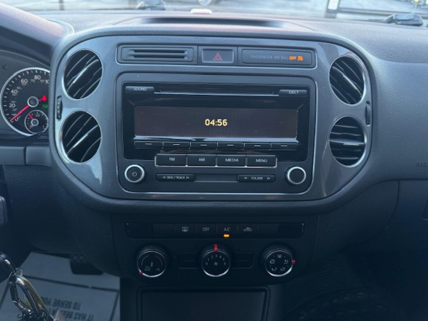 2014 SILVER /BLACK VOLKSWAGEN TIGUAN S; SE; SEL; W S (WVGAV3AX2EW) with an 2.0L engine, 6-Speed Automatic transmission, located at 5900 E. Lancaster Ave., Fort Worth, TX, 76112, (817) 457-5456, 0.000000, 0.000000 - Sporty and versatile, this Tiguan features a 2.0L turbocharged engine, seating for 5 passengers, and up to 23.8 cu. ft. of cargo space. Enjoy features like black cloth interior, power locks, ABS, and stability control—a compact SUV with German engineering, efficiency, and comfort all in one. - Photo#37