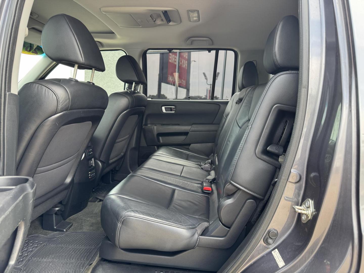 2015 GRAY /BLACK HONDA PILOT TOURING-RES Touring 2WD 5-Spd AT with DVD (5FNYF3H90FB) with an 3.5L engine, 5-Speed Automatic transmission, located at 5900 E. Lancaster Ave., Fort Worth, TX, 76112, (817) 457-5456, 0.000000, 0.000000 - The 2015 Honda Pilot Touring is a spacious 8-passenger SUV with a 3.5L V6, 5-speed automatic, leather seats, sunroof, heated front seats, dual-zone climate, rear power outlet, navigation, DVD system, and backup camera. A reliable family SUV with comfort, tech, and safety. - Photo#12