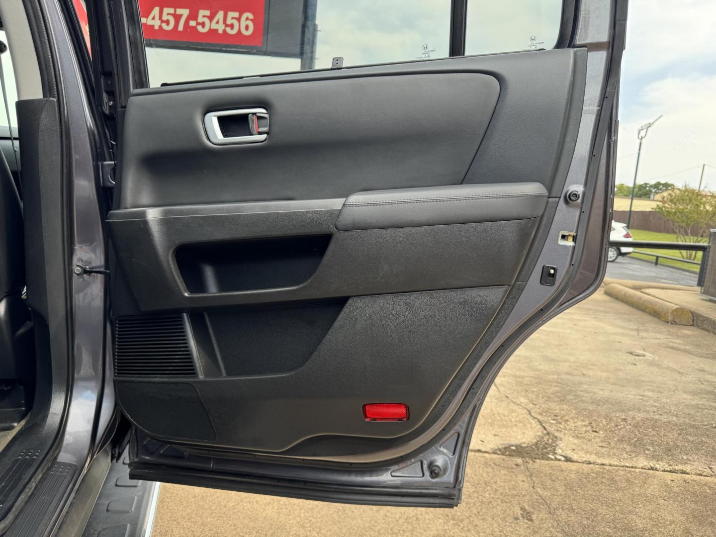 2015 GRAY /BLACK HONDA PILOT TOURING-RES Touring 2WD 5-Spd AT with DVD (5FNYF3H90FB) with an 3.5L engine, 5-Speed Automatic transmission, located at 5900 E. Lancaster Ave., Fort Worth, TX, 76112, (817) 457-5456, 0.000000, 0.000000 - The 2015 Honda Pilot Touring is a spacious 8-passenger SUV with a 3.5L V6, 5-speed automatic, leather seats, sunroof, heated front seats, dual-zone climate, rear power outlet, navigation, DVD system, and backup camera. A reliable family SUV with comfort, tech, and safety. - Photo#15