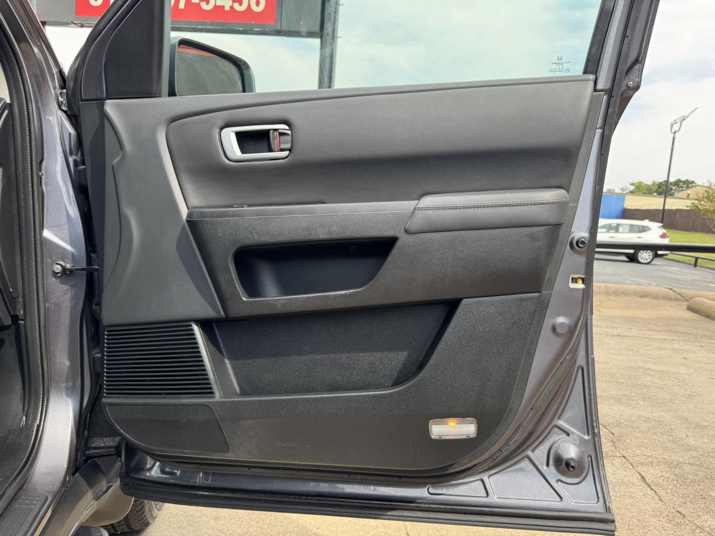 2015 GRAY /BLACK HONDA PILOT TOURING-RES Touring 2WD 5-Spd AT with DVD (5FNYF3H90FB) with an 3.5L engine, 5-Speed Automatic transmission, located at 5900 E. Lancaster Ave., Fort Worth, TX, 76112, (817) 457-5456, 0.000000, 0.000000 - The 2015 Honda Pilot Touring is a spacious 8-passenger SUV with a 3.5L V6, 5-speed automatic, leather seats, sunroof, heated front seats, dual-zone climate, rear power outlet, navigation, DVD system, and backup camera. A reliable family SUV with comfort, tech, and safety. - Photo#17