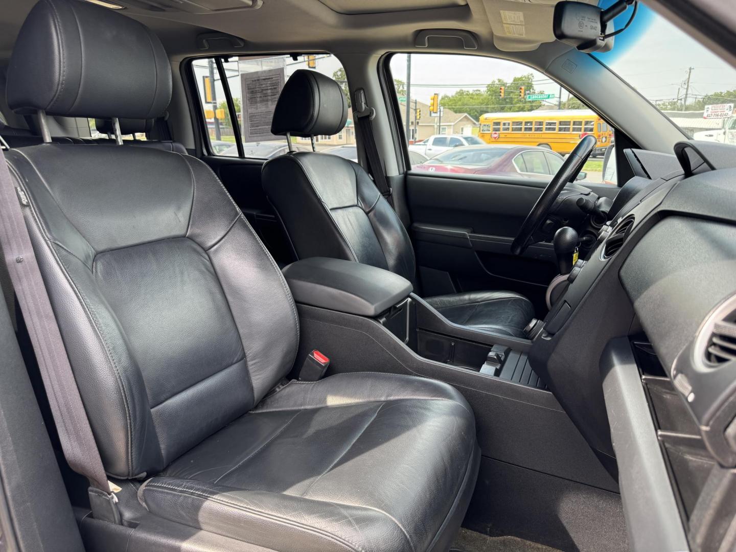 2015 GRAY /BLACK HONDA PILOT TOURING-RES Touring 2WD 5-Spd AT with DVD (5FNYF3H90FB) with an 3.5L engine, 5-Speed Automatic transmission, located at 5900 E. Lancaster Ave., Fort Worth, TX, 76112, (817) 457-5456, 0.000000, 0.000000 - The 2015 Honda Pilot Touring is a spacious 8-passenger SUV with a 3.5L V6, 5-speed automatic, leather seats, sunroof, heated front seats, dual-zone climate, rear power outlet, navigation, DVD system, and backup camera. A reliable family SUV with comfort, tech, and safety. - Photo#19