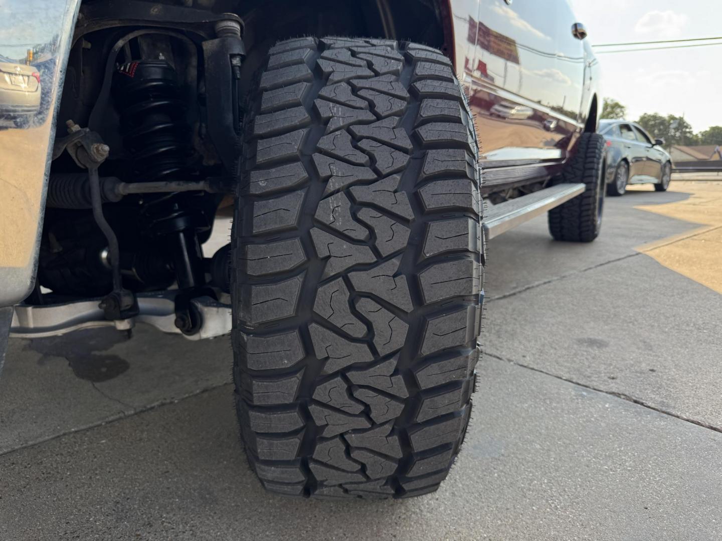 2016 RED /GRAY RAM 1500 SLT; BIG HORN; SLT CREW CAB (1C6RR7LT2GS) with an 5.7L engine, 8-Speed Automatic transmission, located at 5900 E. Lancaster Ave., Fort Worth, TX, 76112, (817) 457-5456, 0.000000, 0.000000 - Check out this 2016 RAM 1500 SLT Crew Cab 4x4, equipped with a 5.7L HEMI V8 and 8-speed automatic transmission. This lifted pickup offers selectable drive modes (2WD, 4WD Auto, 4WD Lock, 4WD Low), front and rear parking assist, tow/haul capability, and a backup camera for confidence on the road. Ins - Photo#21