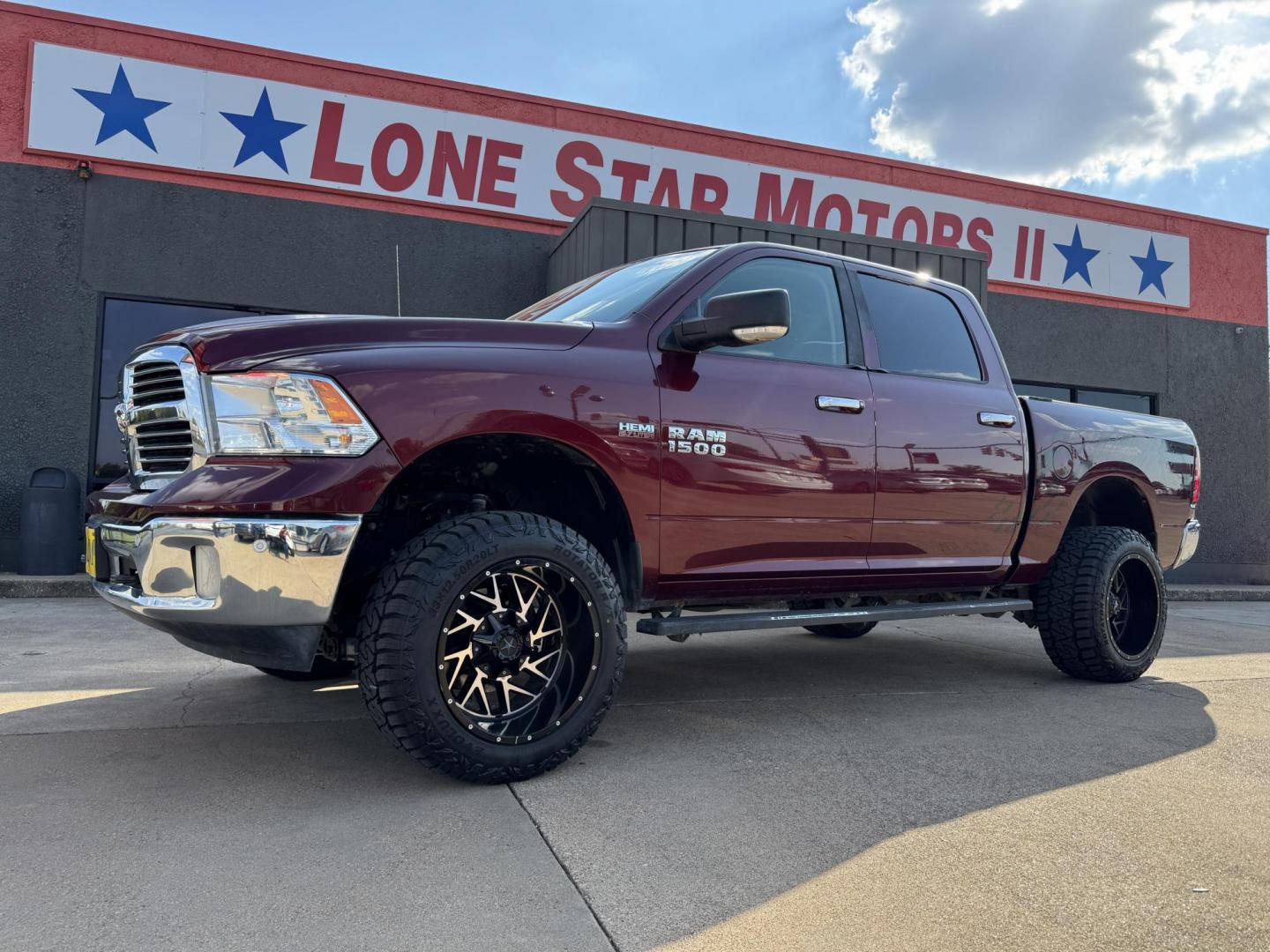2016 RED /GRAY RAM 1500 SLT; BIG HORN; SLT CREW CAB (1C6RR7LT2GS) with an 5.7L engine, 8-Speed Automatic transmission, located at 5900 E. Lancaster Ave., Fort Worth, TX, 76112, (817) 457-5456, 0.000000, 0.000000 - Check out this 2016 RAM 1500 SLT Crew Cab 4x4, equipped with a 5.7L HEMI V8 and 8-speed automatic transmission. This lifted pickup offers selectable drive modes (2WD, 4WD Auto, 4WD Lock, 4WD Low), front and rear parking assist, tow/haul capability, and a backup camera for confidence on the road. Ins - Photo#0