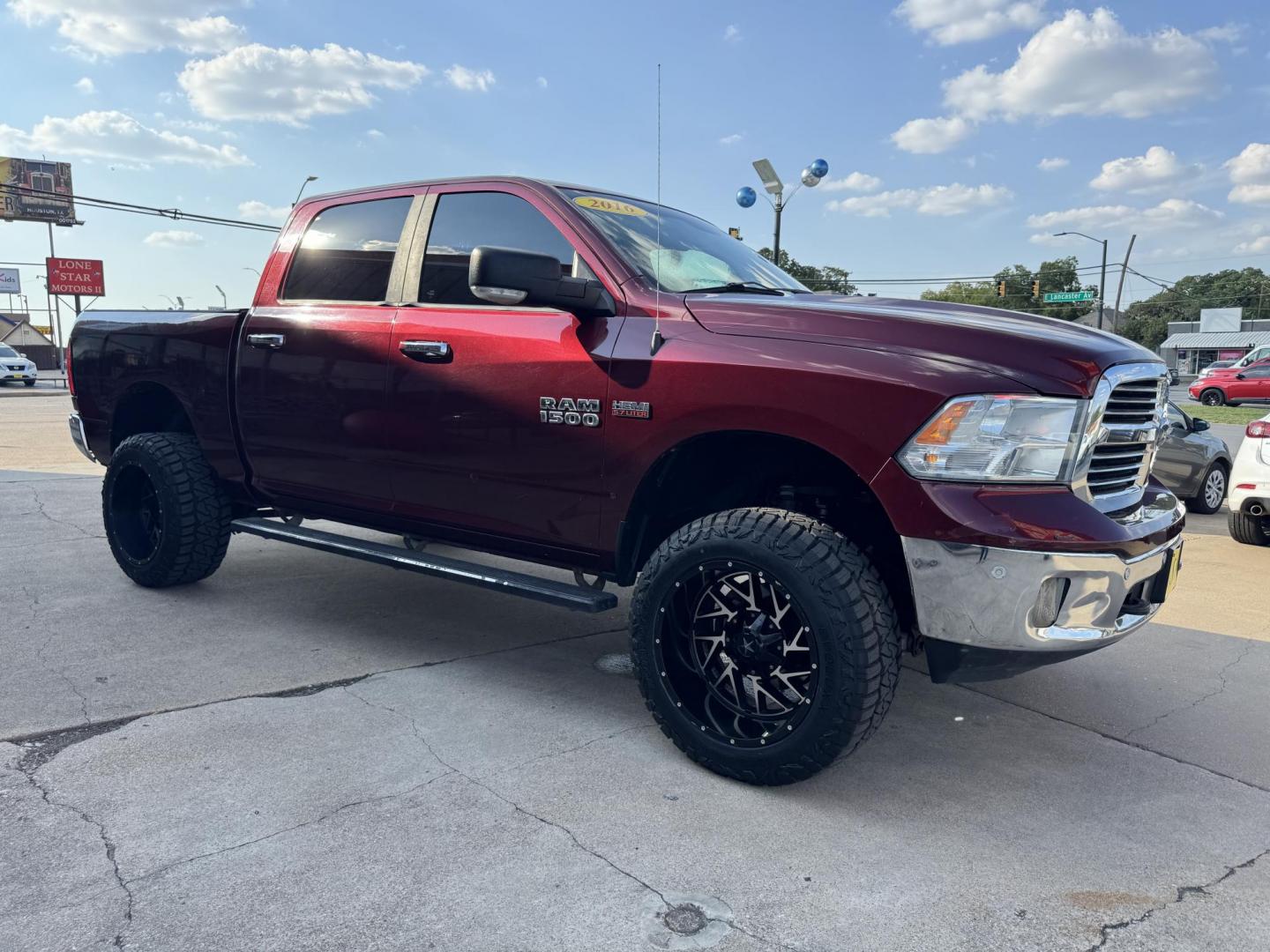 2016 RED /GRAY RAM 1500 SLT; BIG HORN; SLT CREW CAB (1C6RR7LT2GS) with an 5.7L engine, 8-Speed Automatic transmission, located at 5900 E. Lancaster Ave., Fort Worth, TX, 76112, (817) 457-5456, 0.000000, 0.000000 - Check out this 2016 RAM 1500 SLT Crew Cab 4x4, equipped with a 5.7L HEMI V8 and 8-speed automatic transmission. This lifted pickup offers selectable drive modes (2WD, 4WD Auto, 4WD Lock, 4WD Low), front and rear parking assist, tow/haul capability, and a backup camera for confidence on the road. Ins - Photo#2