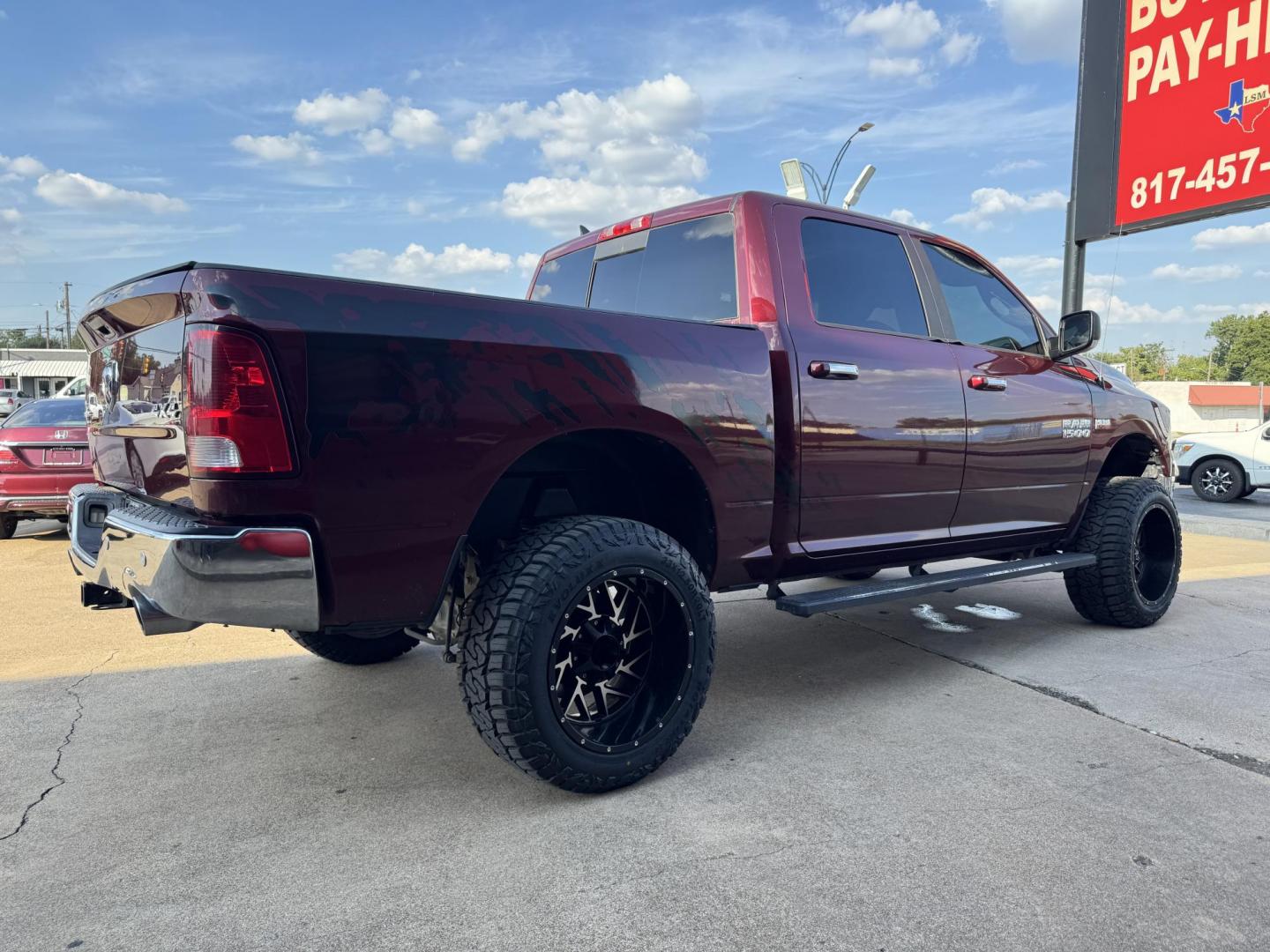2016 RED /GRAY RAM 1500 SLT; BIG HORN; SLT CREW CAB (1C6RR7LT2GS) with an 5.7L engine, 8-Speed Automatic transmission, located at 5900 E. Lancaster Ave., Fort Worth, TX, 76112, (817) 457-5456, 0.000000, 0.000000 - Check out this 2016 RAM 1500 SLT Crew Cab 4x4, equipped with a 5.7L HEMI V8 and 8-speed automatic transmission. This lifted pickup offers selectable drive modes (2WD, 4WD Auto, 4WD Lock, 4WD Low), front and rear parking assist, tow/haul capability, and a backup camera for confidence on the road. Ins - Photo#3