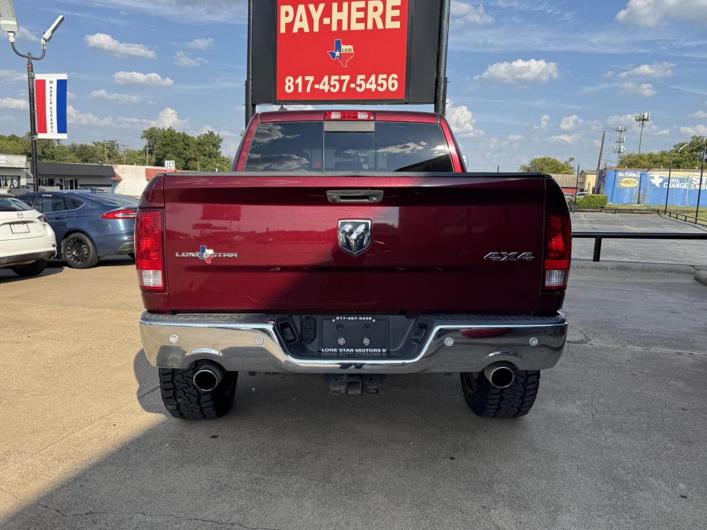 2016 RED /GRAY RAM 1500 SLT; BIG HORN; SLT CREW CAB (1C6RR7LT2GS) with an 5.7L engine, 8-Speed Automatic transmission, located at 5900 E. Lancaster Ave., Fort Worth, TX, 76112, (817) 457-5456, 0.000000, 0.000000 - Check out this 2016 RAM 1500 SLT Crew Cab 4x4, equipped with a 5.7L HEMI V8 and 8-speed automatic transmission. This lifted pickup offers selectable drive modes (2WD, 4WD Auto, 4WD Lock, 4WD Low), front and rear parking assist, tow/haul capability, and a backup camera for confidence on the road. Ins - Photo#4