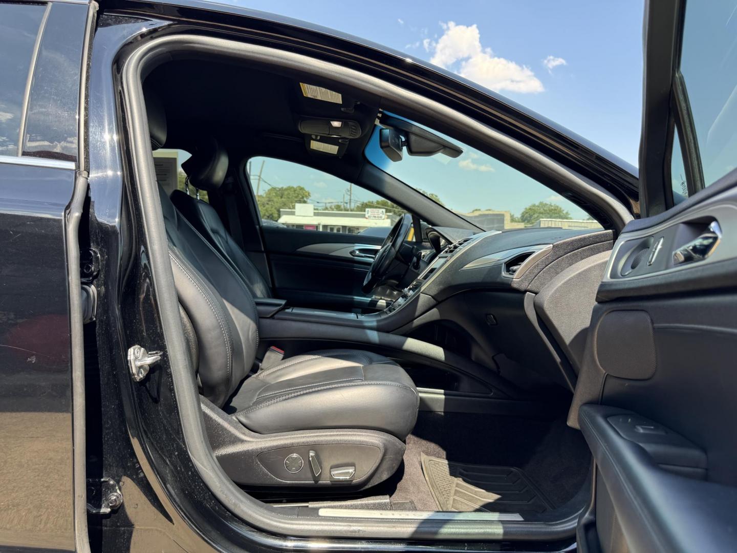 2017 BLACK /BLACK LINCOLN MKZ SELECT HEV SELECT (3LN6L5LU9HR) with an 2.0L engine, CVT AUTOMATIC transmission, located at 5900 E. Lancaster Ave., Fort Worth, TX, 76112, (817) 457-5456, 0.000000, 0.000000 - The 2017 Lincoln MKZ Hybrid Select is powered by a 2.0L 4-cylinder hybrid engine paired with a continuously variable transmission (CVT) and front-wheel drive, delivering efficient performance and smooth handling. The luxurious interior includes leather seats, front and rear heated seats, heated stee - Photo#15