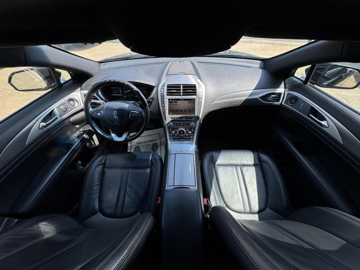2017 BLACK /BLACK LINCOLN MKZ SELECT HEV SELECT (3LN6L5LU9HR) with an 2.0L engine, CVT AUTOMATIC transmission, located at 5900 E. Lancaster Ave., Fort Worth, TX, 76112, (817) 457-5456, 0.000000, 0.000000 - The 2017 Lincoln MKZ Hybrid Select is powered by a 2.0L 4-cylinder hybrid engine paired with a continuously variable transmission (CVT) and front-wheel drive, delivering efficient performance and smooth handling. The luxurious interior includes leather seats, front and rear heated seats, heated stee - Photo#17