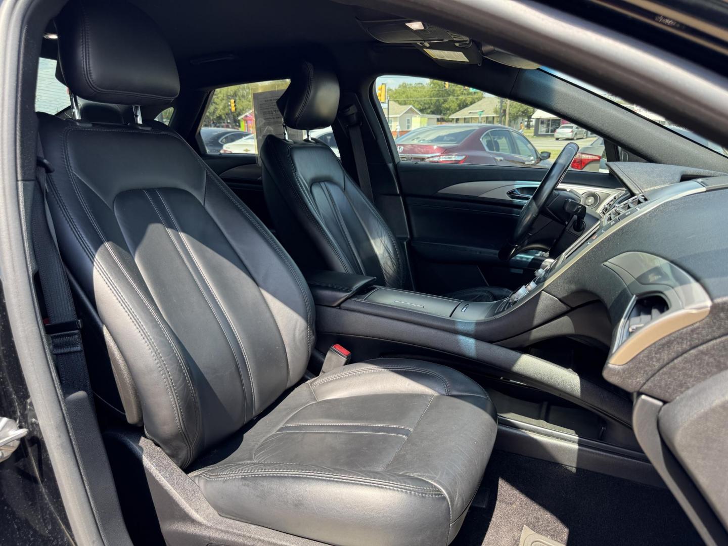 2017 BLACK /BLACK LINCOLN MKZ SELECT HEV SELECT (3LN6L5LU9HR) with an 2.0L engine, CVT AUTOMATIC transmission, located at 5900 E. Lancaster Ave., Fort Worth, TX, 76112, (817) 457-5456, 0.000000, 0.000000 - The 2017 Lincoln MKZ Hybrid Select is powered by a 2.0L 4-cylinder hybrid engine paired with a continuously variable transmission (CVT) and front-wheel drive, delivering efficient performance and smooth handling. The luxurious interior includes leather seats, front and rear heated seats, heated stee - Photo#16