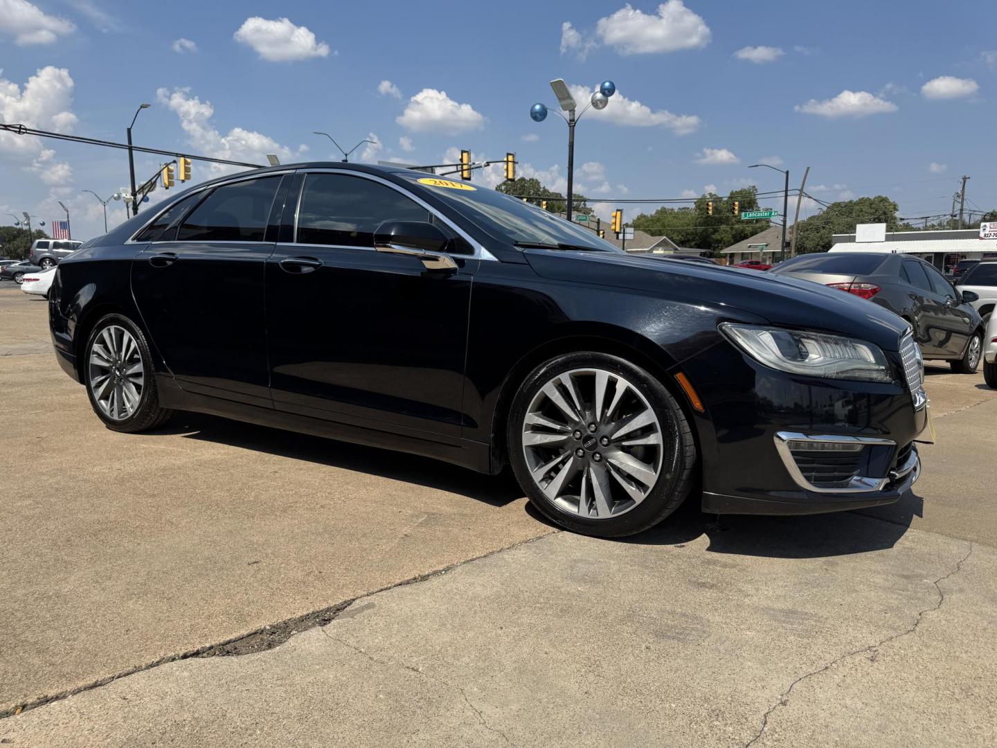 2017 BLACK /BLACK LINCOLN MKZ SELECT HEV SELECT (3LN6L5LU9HR) with an 2.0L engine, CVT AUTOMATIC transmission, located at 5900 E. Lancaster Ave., Fort Worth, TX, 76112, (817) 457-5456, 0.000000, 0.000000 - The 2017 Lincoln MKZ Hybrid Select is powered by a 2.0L 4-cylinder hybrid engine paired with a continuously variable transmission (CVT) and front-wheel drive, delivering efficient performance and smooth handling. The luxurious interior includes leather seats, front and rear heated seats, heated stee - Photo#2