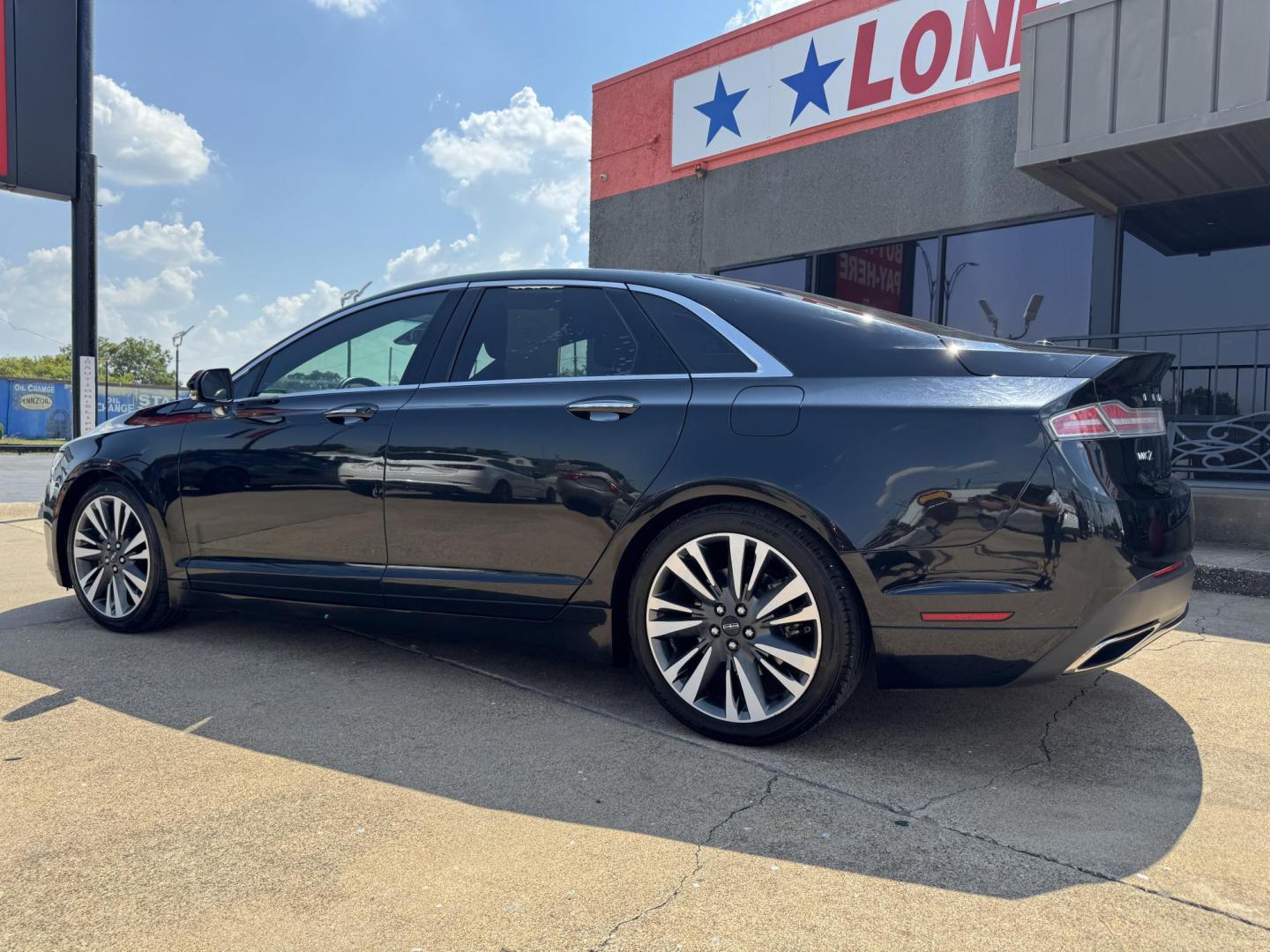 2017 BLACK /BLACK LINCOLN MKZ SELECT HEV SELECT (3LN6L5LU9HR) with an 2.0L engine, CVT AUTOMATIC transmission, located at 5900 E. Lancaster Ave., Fort Worth, TX, 76112, (817) 457-5456, 0.000000, 0.000000 - The 2017 Lincoln MKZ Hybrid Select is powered by a 2.0L 4-cylinder hybrid engine paired with a continuously variable transmission (CVT) and front-wheel drive, delivering efficient performance and smooth handling. The luxurious interior includes leather seats, front and rear heated seats, heated stee - Photo#5