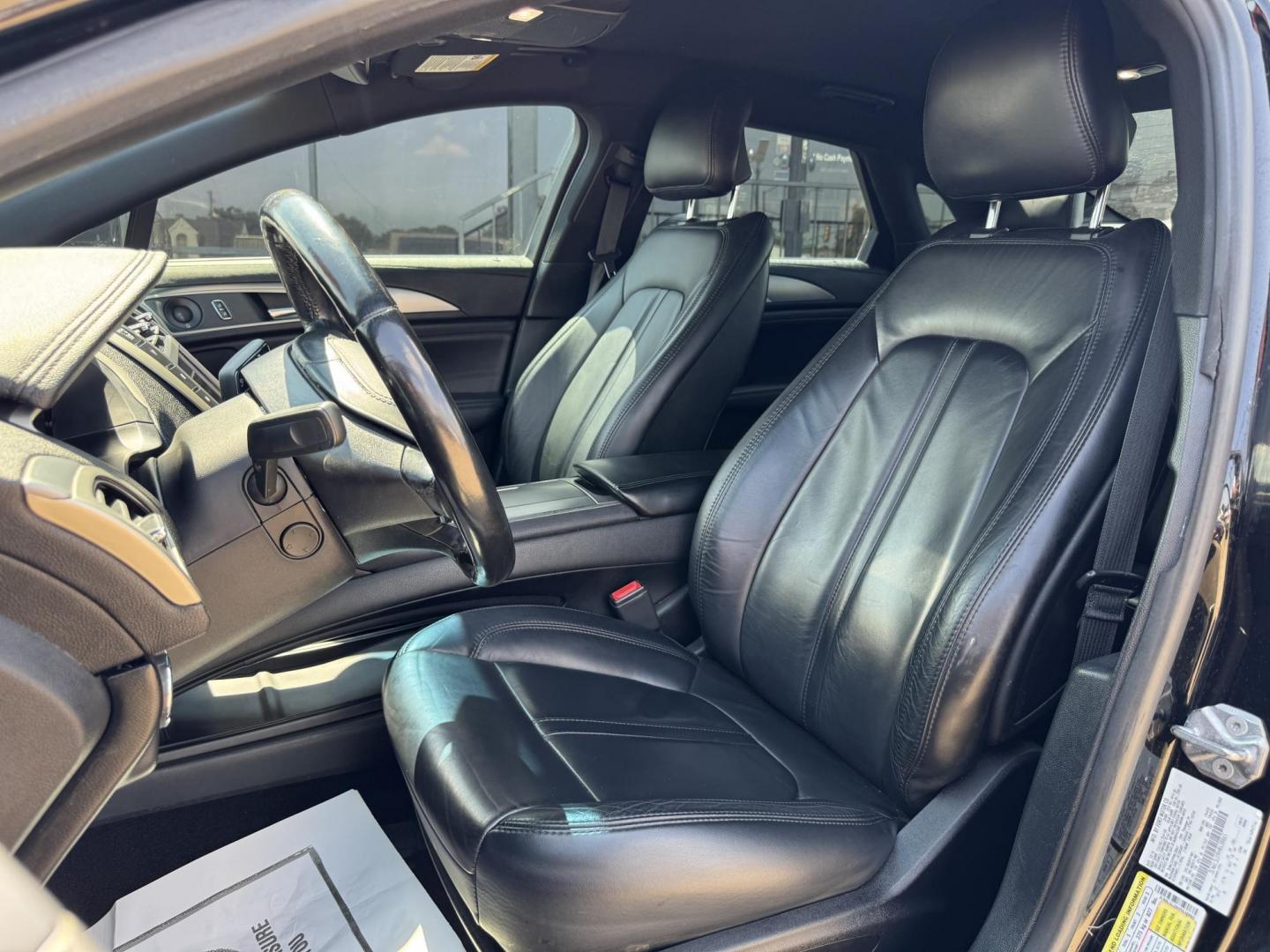 2017 BLACK /BLACK LINCOLN MKZ SELECT HEV SELECT (3LN6L5LU9HR) with an 2.0L engine, CVT AUTOMATIC transmission, located at 5900 E. Lancaster Ave., Fort Worth, TX, 76112, (817) 457-5456, 0.000000, 0.000000 - The 2017 Lincoln MKZ Hybrid Select is powered by a 2.0L 4-cylinder hybrid engine paired with a continuously variable transmission (CVT) and front-wheel drive, delivering efficient performance and smooth handling. The luxurious interior includes leather seats, front and rear heated seats, heated stee - Photo#8