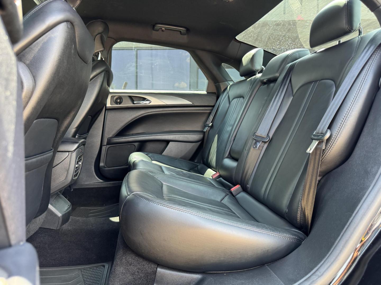 2017 BLACK /BLACK LINCOLN MKZ SELECT HEV SELECT (3LN6L5LU9HR) with an 2.0L engine, CVT AUTOMATIC transmission, located at 5900 E. Lancaster Ave., Fort Worth, TX, 76112, (817) 457-5456, 0.000000, 0.000000 - The 2017 Lincoln MKZ Hybrid Select is powered by a 2.0L 4-cylinder hybrid engine paired with a continuously variable transmission (CVT) and front-wheel drive, delivering efficient performance and smooth handling. The luxurious interior includes leather seats, front and rear heated seats, heated stee - Photo#10