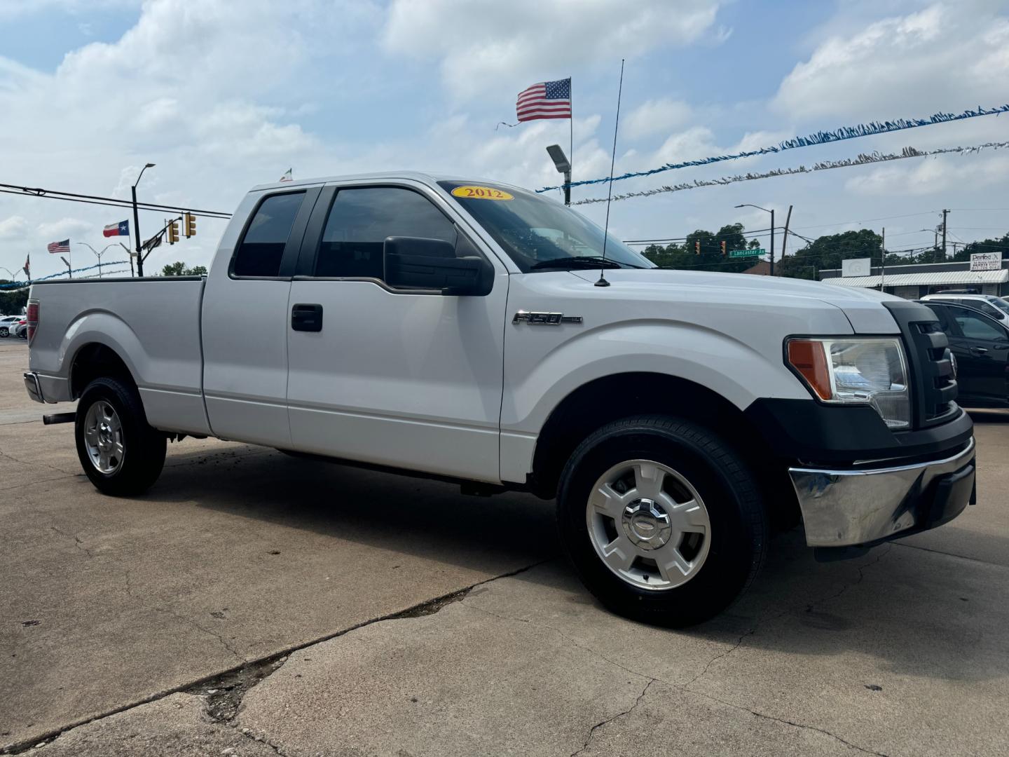 2012 WHITE FORD F-150 STX; XL; XLT; (1FTEX1CM0CF) , located at 5900 E. Lancaster Ave., Fort Worth, TX, 76112, (817) 457-5456, 0.000000, 0.000000 - This is a 2012 FORD F-150 STX, XLT, 4 DR SUPER CAB that is in excellent condition. The interior is clean with no rips or tears or stains. All power windows, door locks and seats. Ice cold AC for those hot Texas summer days. It is equipped with a CD player, AM/FM radio. It runs and drives like new. T - Photo#2