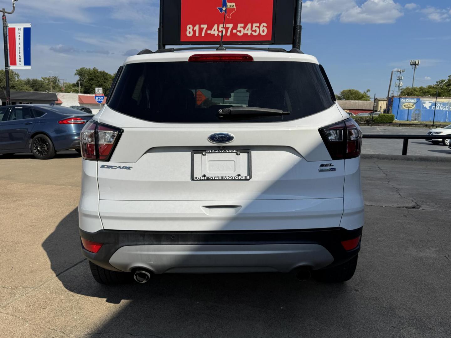 2018 WHITE /BLACK FORD ESCAPE SEL (1FMCU9HD4JU) , located at 5900 E. Lancaster Ave., Fort Worth, TX, 76112, (817) 457-5456, 0.000000, 0.000000 - Photo#4