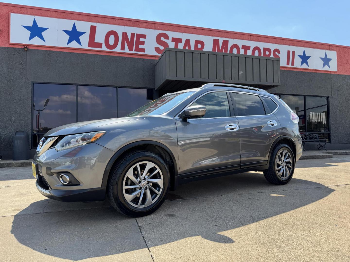 2015 BROWN /BLACK NISSAN ROGUE SL (5N1AT2MT9FC) with an 2.5L engine, CVT transmission, located at 5900 E. Lancaster Ave., Fort Worth, TX, 76112, (817) 457-5456, 0.000000, 0.000000 - The 2015 Nissan Rogue SL offers efficiency, comfort, and advanced tech. Powered by a 2.5L 4-cylinder engine with CVT, it delivers up to 33 MPG highway. Features include leather heated seats, moonroof, dual-zone climate control, navigation with satellite view, and a surround-view camera system with f - Photo#0