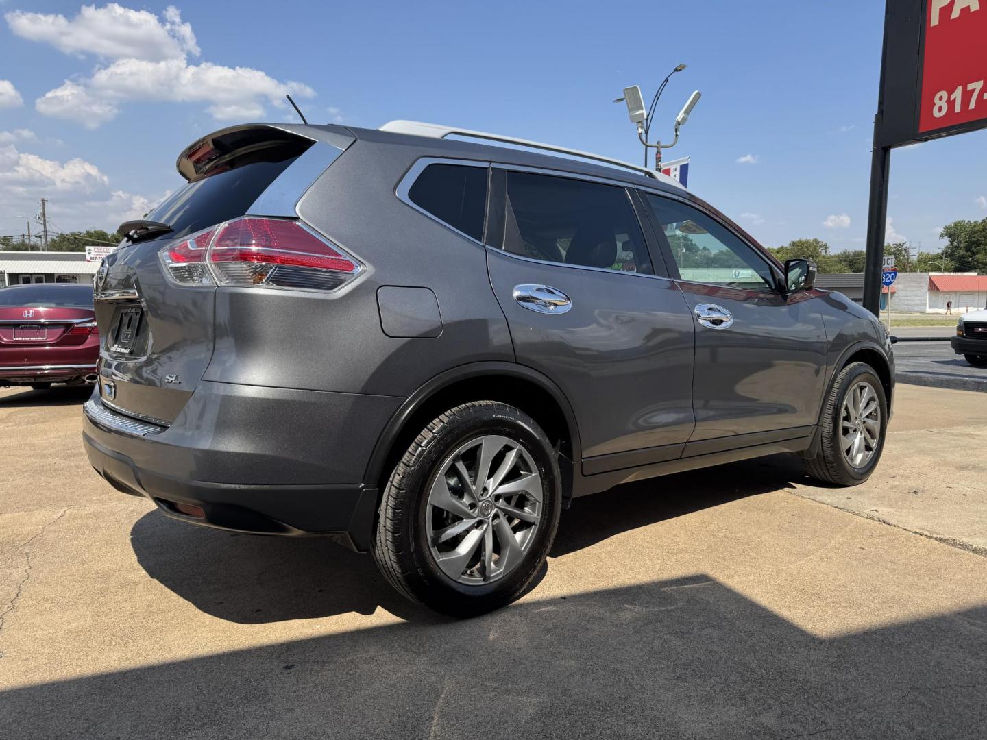 2015 BROWN /BLACK NISSAN ROGUE SL (5N1AT2MT9FC) with an 2.5L engine, CVT transmission, located at 5900 E. Lancaster Ave., Fort Worth, TX, 76112, (817) 457-5456, 0.000000, 0.000000 - The 2015 Nissan Rogue SL offers efficiency, comfort, and advanced tech. Powered by a 2.5L 4-cylinder engine with CVT, it delivers up to 33 MPG highway. Features include leather heated seats, moonroof, dual-zone climate control, navigation with satellite view, and a surround-view camera system with f - Photo#3