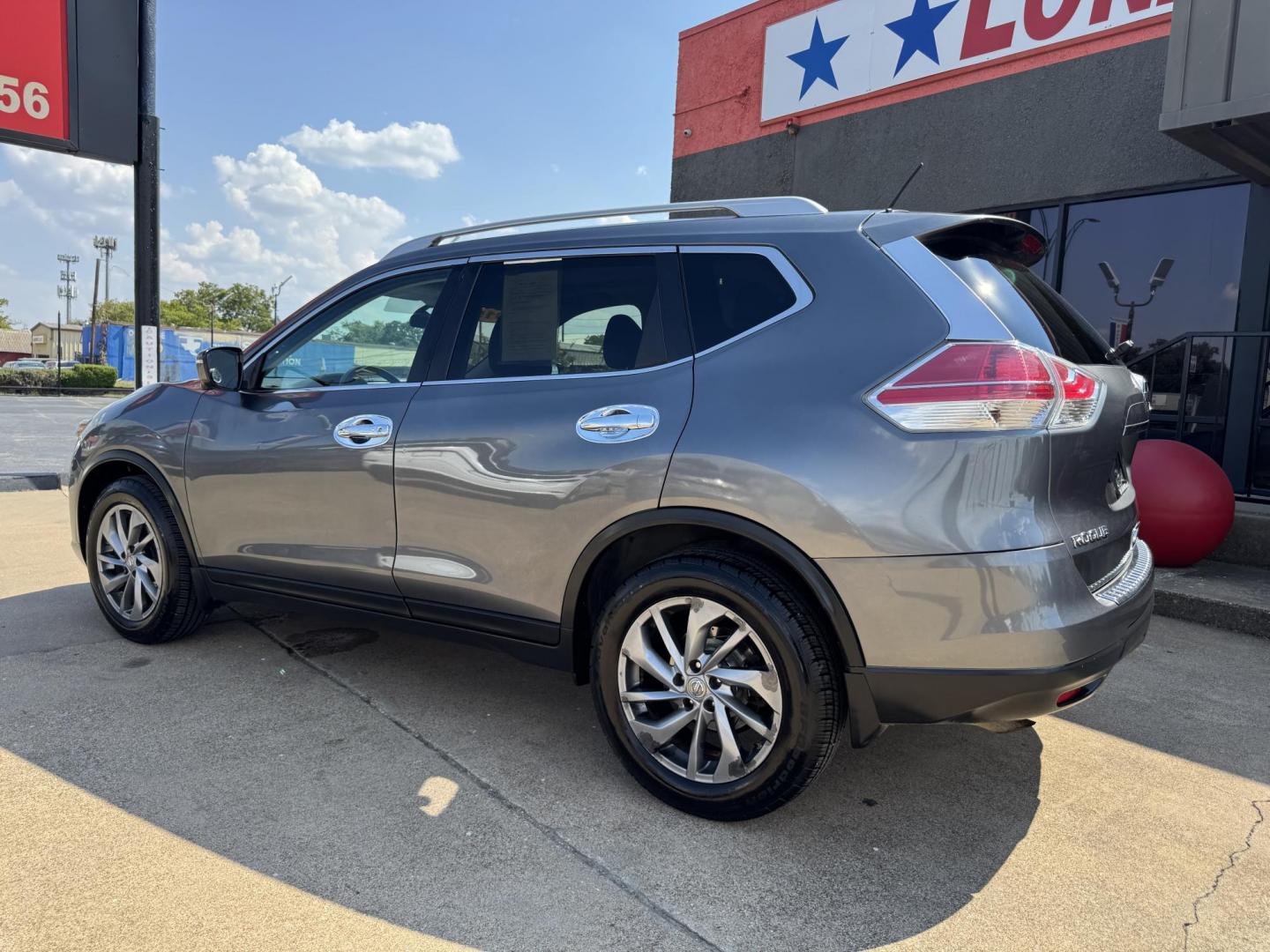 2015 BROWN /BLACK NISSAN ROGUE SL (5N1AT2MT9FC) with an 2.5L engine, CVT transmission, located at 5900 E. Lancaster Ave., Fort Worth, TX, 76112, (817) 457-5456, 0.000000, 0.000000 - The 2015 Nissan Rogue SL offers efficiency, comfort, and advanced tech. Powered by a 2.5L 4-cylinder engine with CVT, it delivers up to 33 MPG highway. Features include leather heated seats, moonroof, dual-zone climate control, navigation with satellite view, and a surround-view camera system with f - Photo#6