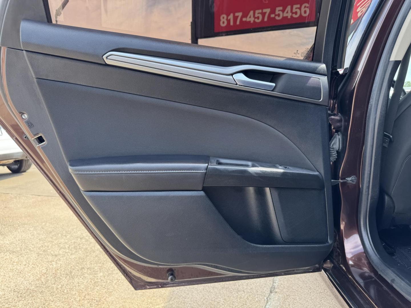 2019 RED FORD FUSION SE SE (3FA6P0HD5KR) with an 1.5L engine, 6-Speed Automatic transmission, located at 5900 E. Lancaster Ave., Fort Worth, TX, 76112, (817) 457-5456, 0.000000, 0.000000 - The 2019 Ford Fusion SE delivers efficiency and comfort with its 1.5L EcoBoost engine offering up to 34 MPG highway. Features include Bluetooth, backup camera, alloy wheels, and seating for five. A reliable sedan with modern technology and great fuel economy - Photo#10