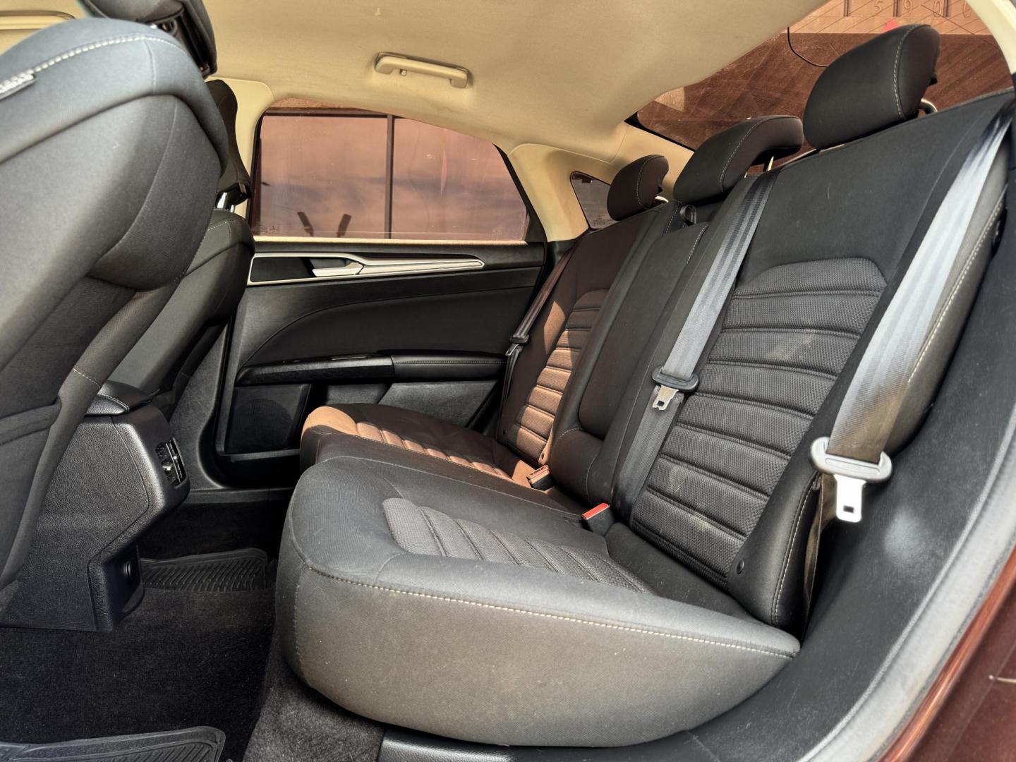 2019 RED FORD FUSION SE SE (3FA6P0HD5KR) with an 1.5L engine, 6-Speed Automatic transmission, located at 5900 E. Lancaster Ave., Fort Worth, TX, 76112, (817) 457-5456, 0.000000, 0.000000 - The 2019 Ford Fusion SE delivers efficiency and comfort with its 1.5L EcoBoost engine offering up to 34 MPG highway. Features include Bluetooth, backup camera, alloy wheels, and seating for five. A reliable sedan with modern technology and great fuel economy - Photo#11