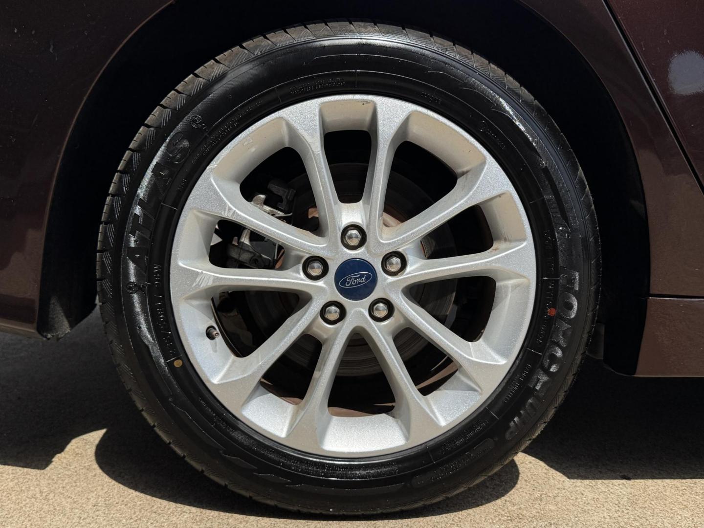 2019 RED FORD FUSION SE SE (3FA6P0HD5KR) with an 1.5L engine, 6-Speed Automatic transmission, located at 5900 E. Lancaster Ave., Fort Worth, TX, 76112, (817) 457-5456, 0.000000, 0.000000 - The 2019 Ford Fusion SE delivers efficiency and comfort with its 1.5L EcoBoost engine offering up to 34 MPG highway. Features include Bluetooth, backup camera, alloy wheels, and seating for five. A reliable sedan with modern technology and great fuel economy - Photo#21