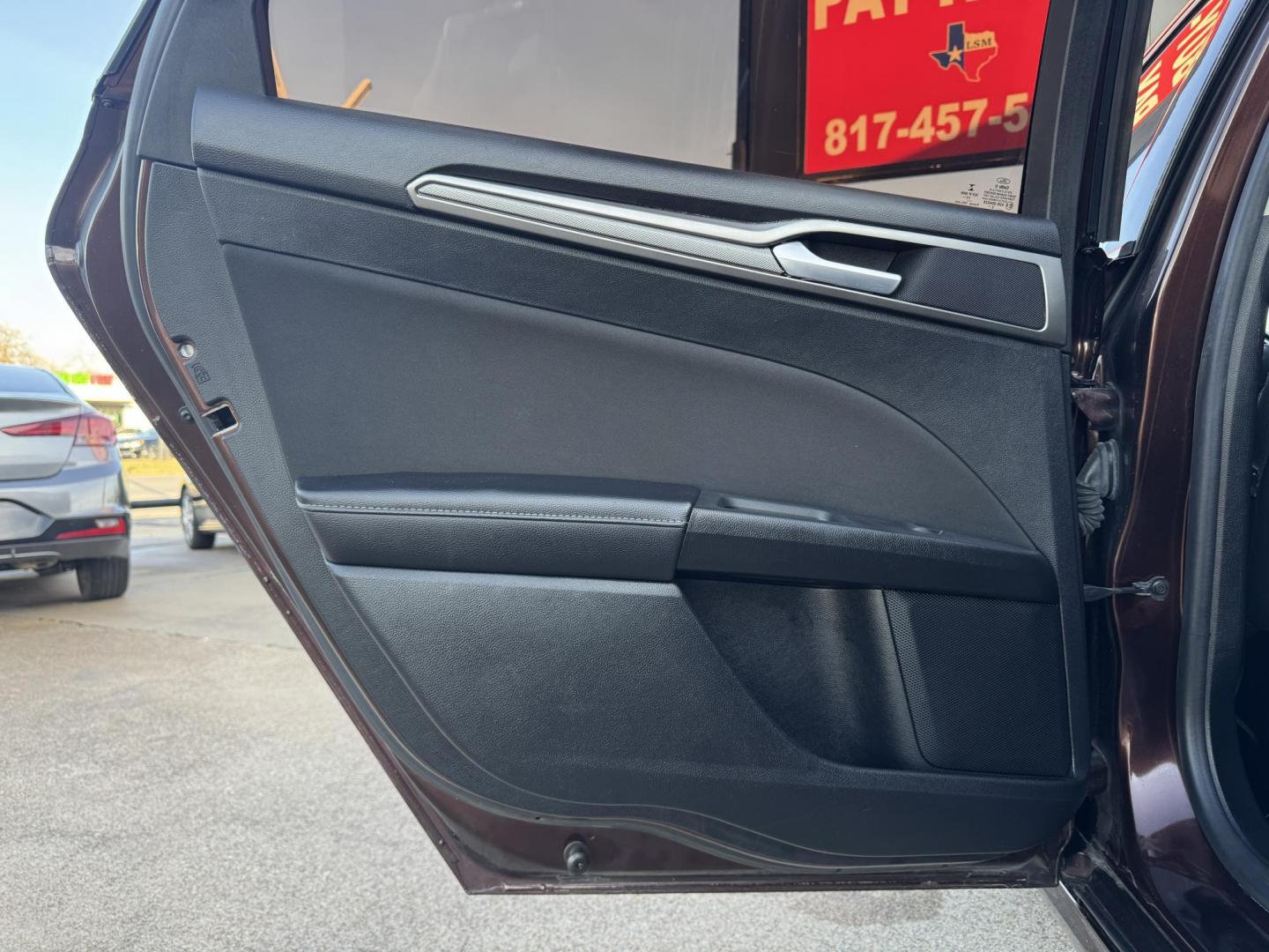 2019 BROWN FORD FUSION SE SE (3FA6P0HD5KR) with an 1.5L engine, 6-Speed Automatic transmission, located at 5900 E. Lancaster Ave., Fort Worth, TX, 76112, (817) 457-5456, 0.000000, 0.000000 - The 2019 Ford Fusion SE delivers efficiency and comfort with its 1.5L EcoBoost engine offering up to 34 MPG highway. Features include Bluetooth, backup camera, alloy wheels, and seating for five. A reliable sedan with modern technology and great fuel economy - Photo#10