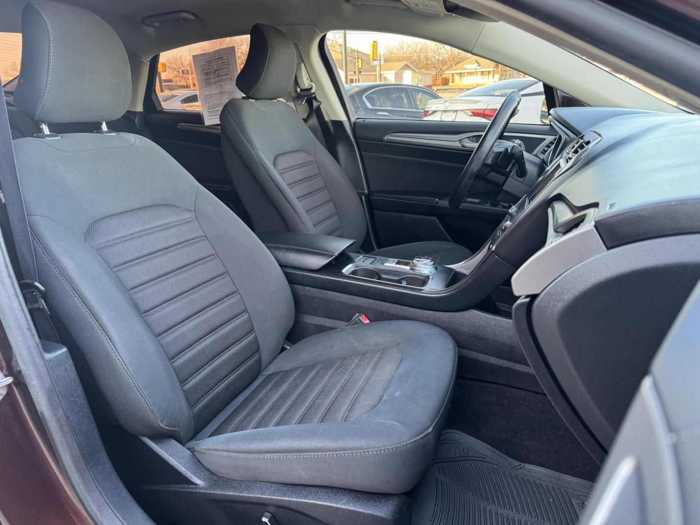 2019 BROWN FORD FUSION SE SE (3FA6P0HD5KR) with an 1.5L engine, 6-Speed Automatic transmission, located at 5900 E. Lancaster Ave., Fort Worth, TX, 76112, (817) 457-5456, 0.000000, 0.000000 - The 2019 Ford Fusion SE delivers efficiency and comfort with its 1.5L EcoBoost engine offering up to 34 MPG highway. Features include Bluetooth, backup camera, alloy wheels, and seating for five. A reliable sedan with modern technology and great fuel economy - Photo#16