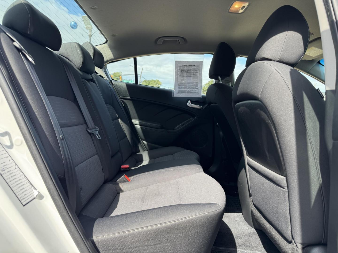 2018 WHITE /BLACK KIA FORTE LX; S LX (3KPFL4A70JE) with an 2.0L engine, 6-Speed Automatic transmission, located at 5900 E. Lancaster Ave., Fort Worth, TX, 76112, (817) 457-5456, 0.000000, 0.000000 - The 2018 Kia Forte LX combines efficiency and comfort with a 2.0L 4-cylinder engine, 6-speed automatic transmission, and impressive 29 city / 37 highway MPG. It seats five with spacious legroom and features a backup camera, phone connectivity, 4-wheel ABS disc brakes, and coil spring suspension. A r - Photo#13