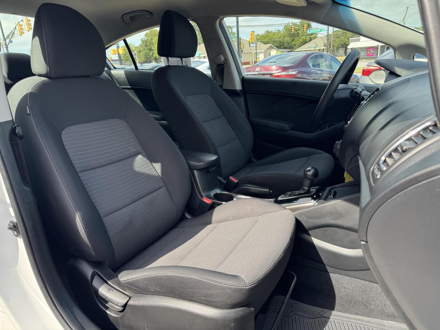 2018 WHITE /BLACK KIA FORTE LX; S LX (3KPFL4A70JE) with an 2.0L engine, 6-Speed Automatic transmission, located at 5900 E. Lancaster Ave., Fort Worth, TX, 76112, (817) 457-5456, 0.000000, 0.000000 - The 2018 Kia Forte LX combines efficiency and comfort with a 2.0L 4-cylinder engine, 6-speed automatic transmission, and impressive 29 city / 37 highway MPG. It seats five with spacious legroom and features a backup camera, phone connectivity, 4-wheel ABS disc brakes, and coil spring suspension. A r - Photo#16