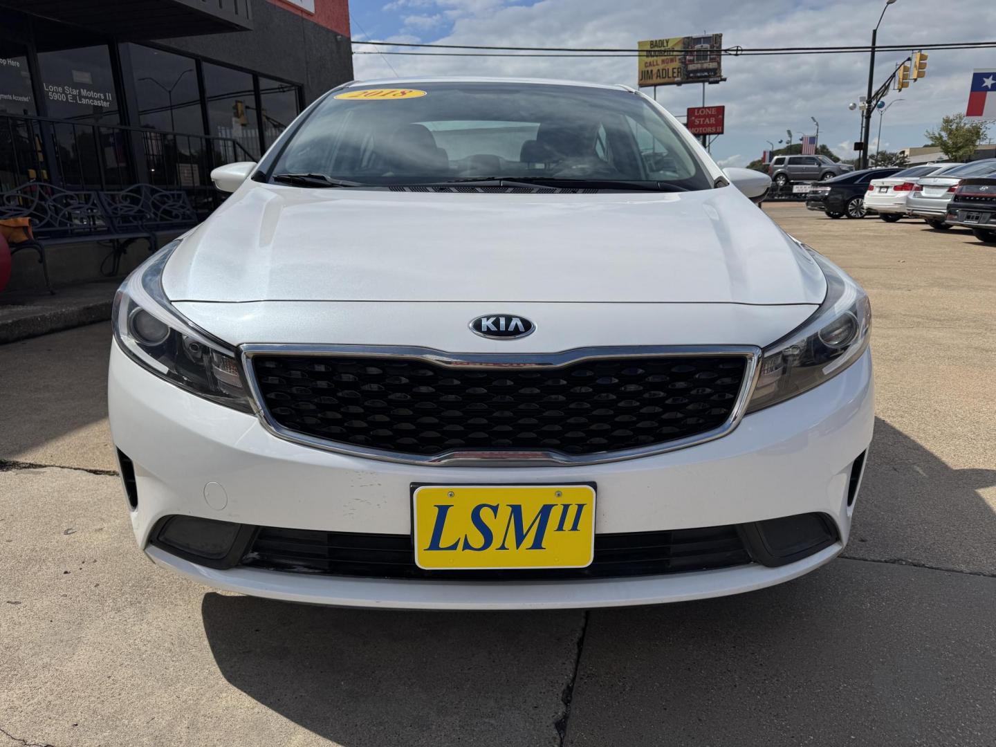 2018 WHITE /BLACK KIA FORTE LX; S LX (3KPFL4A70JE) with an 2.0L engine, 6-Speed Automatic transmission, located at 5900 E. Lancaster Ave., Fort Worth, TX, 76112, (817) 457-5456, 0.000000, 0.000000 - The 2018 Kia Forte LX combines efficiency and comfort with a 2.0L 4-cylinder engine, 6-speed automatic transmission, and impressive 29 city / 37 highway MPG. It seats five with spacious legroom and features a backup camera, phone connectivity, 4-wheel ABS disc brakes, and coil spring suspension. A r - Photo#1