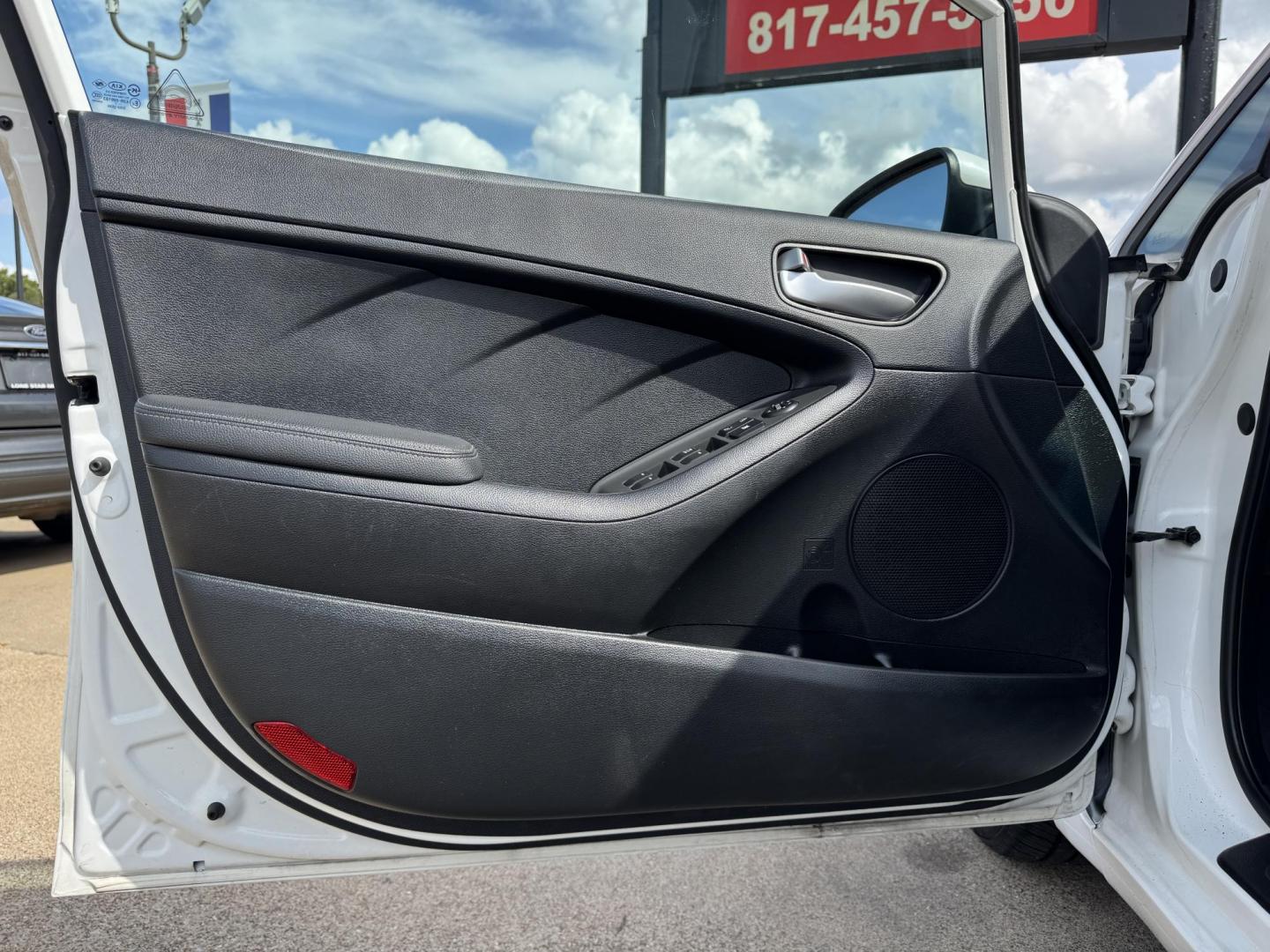 2018 WHITE /BLACK KIA FORTE LX; S LX (3KPFL4A70JE) with an 2.0L engine, 6-Speed Automatic transmission, located at 5900 E. Lancaster Ave., Fort Worth, TX, 76112, (817) 457-5456, 0.000000, 0.000000 - The 2018 Kia Forte LX combines efficiency and comfort with a 2.0L 4-cylinder engine, 6-speed automatic transmission, and impressive 29 city / 37 highway MPG. It seats five with spacious legroom and features a backup camera, phone connectivity, 4-wheel ABS disc brakes, and coil spring suspension. A r - Photo#7