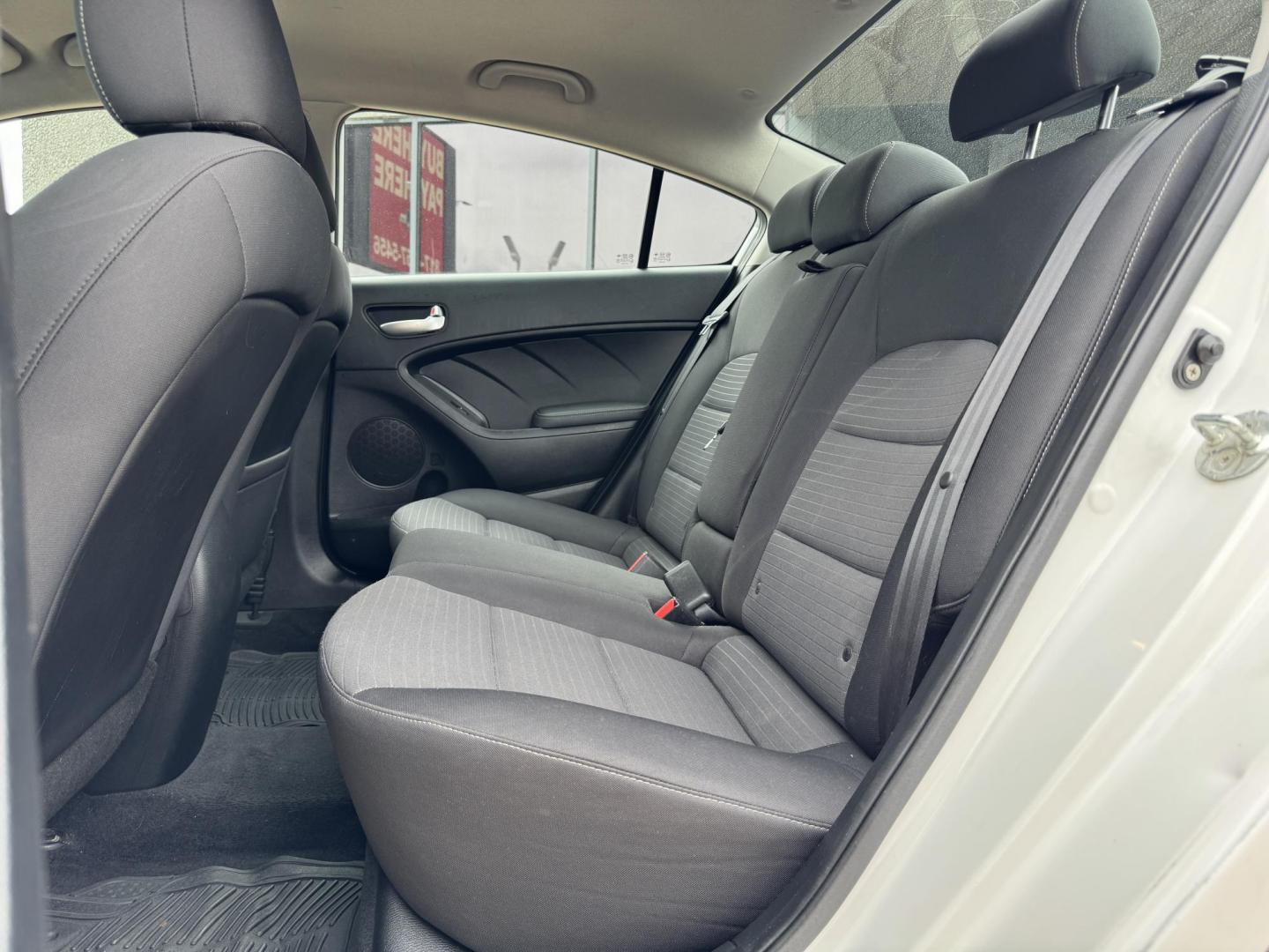 2018 WHITE /BLACK KIA FORTE LX; S LX (3KPFL4A70JE) with an 2.0L engine, 6-Speed Automatic transmission, located at 5900 E. Lancaster Ave., Fort Worth, TX, 76112, (817) 457-5456, 0.000000, 0.000000 - The 2018 Kia Forte LX combines efficiency and comfort with a 2.0L 4-cylinder engine, 6-speed automatic transmission, and impressive 29 city / 37 highway MPG. It seats five with spacious legroom and features a backup camera, phone connectivity, 4-wheel ABS disc brakes, and coil spring suspension. A r - Photo#12