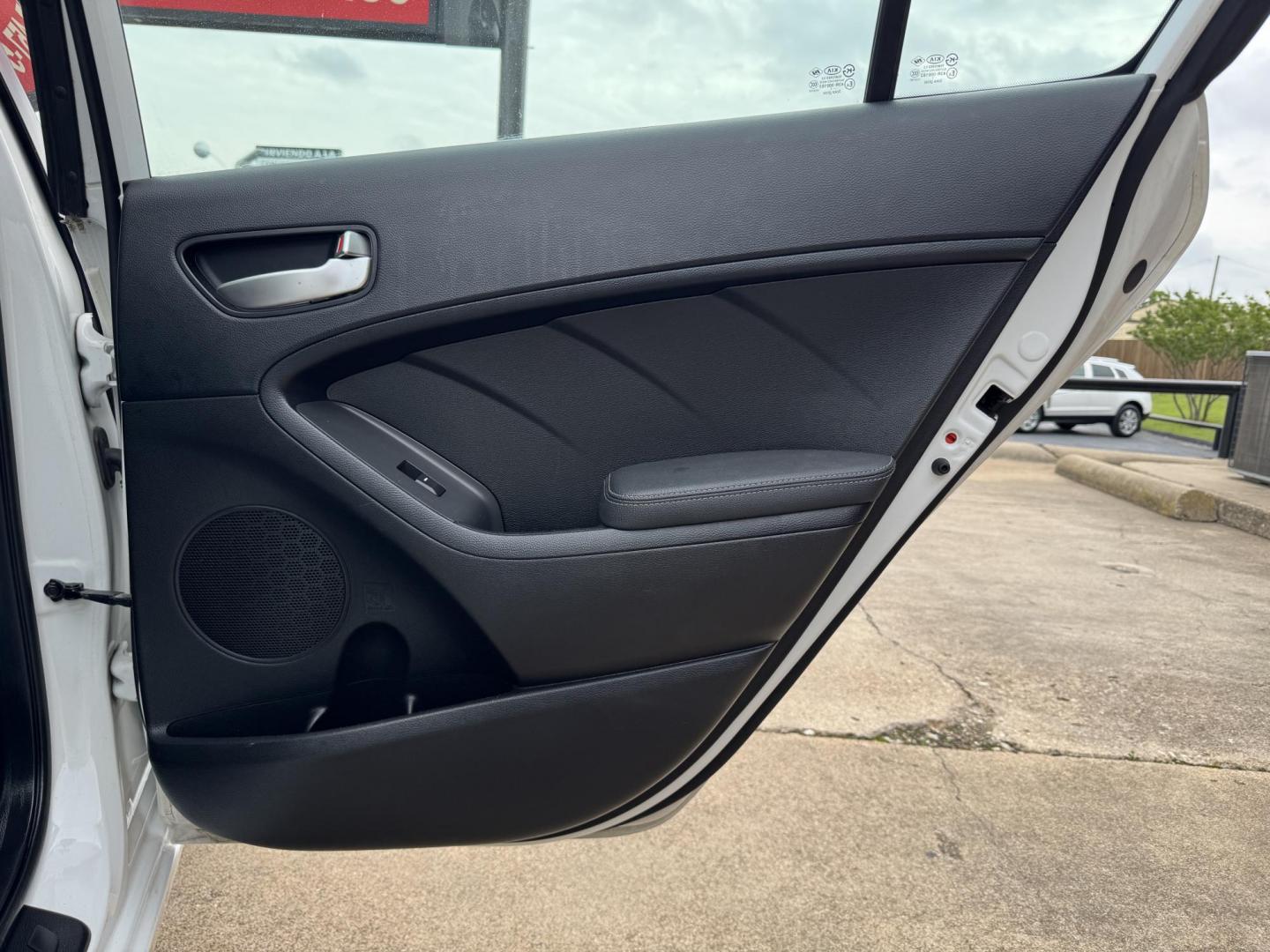 2018 WHITE /BLACK KIA FORTE LX; S LX (3KPFL4A70JE) with an 2.0L engine, 6-Speed Automatic transmission, located at 5900 E. Lancaster Ave., Fort Worth, TX, 76112, (817) 457-5456, 0.000000, 0.000000 - The 2018 Kia Forte LX combines efficiency and comfort with a 2.0L 4-cylinder engine, 6-speed automatic transmission, and impressive 29 city / 37 highway MPG. It seats five with spacious legroom and features a backup camera, phone connectivity, 4-wheel ABS disc brakes, and coil spring suspension. A r - Photo#13