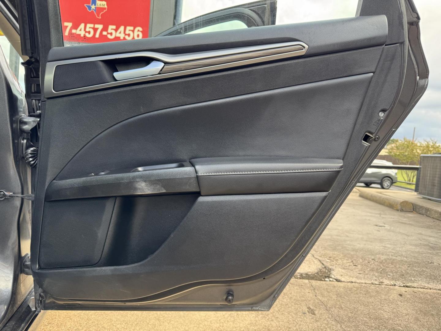 2017 GRAY /BLACK FORD FUSION SE SE (3FA6P0HD2HR) with an 1.5L engine, 6-Speed Automatic transmission, located at 5900 E. Lancaster Ave., Fort Worth, TX, 76112, (817) 457-5456, 0.000000, 0.000000 - The 2017 Ford Fusion SE offers a perfect mix of style and efficiency with its 1.5L 4-cylinder engine and 6-speed automatic transmission, delivering 22 city / 34 highway MPG. This FWD sedan seats five comfortably and comes equipped with backup camera, phone connectivity, alloy wheels, and dual climat - Photo#12