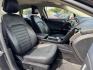 2017 GRAY /BLACK FORD FUSION SE SE (3FA6P0HD2HR) with an 1.5L engine, 6-Speed Automatic transmission, located at 5900 E. Lancaster Ave., Fort Worth, TX, 76112, (817) 457-5456, 0.000000, 0.000000 - The 2017 Ford Fusion SE offers a perfect mix of style and efficiency with its 1.5L 4-cylinder engine and 6-speed automatic transmission, delivering 22 city / 34 highway MPG. This FWD sedan seats five comfortably and comes equipped with backup camera, phone connectivity, alloy wheels, and dual climat - Photo#16
