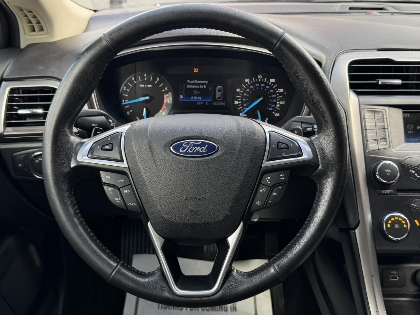 2017 GRAY /BLACK FORD FUSION SE SE (3FA6P0HD2HR) with an 1.5L engine, 6-Speed Automatic transmission, located at 5900 E. Lancaster Ave., Fort Worth, TX, 76112, (817) 457-5456, 0.000000, 0.000000 - The 2017 Ford Fusion SE offers a perfect mix of style and efficiency with its 1.5L 4-cylinder engine and 6-speed automatic transmission, delivering 22 city / 34 highway MPG. This FWD sedan seats five comfortably and comes equipped with backup camera, phone connectivity, alloy wheels, and dual climat - Photo#18