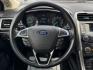 2017 GRAY /BLACK FORD FUSION SE SE (3FA6P0HD2HR) with an 1.5L engine, 6-Speed Automatic transmission, located at 5900 E. Lancaster Ave., Fort Worth, TX, 76112, (817) 457-5456, 0.000000, 0.000000 - The 2017 Ford Fusion SE offers a perfect mix of style and efficiency with its 1.5L 4-cylinder engine and 6-speed automatic transmission, delivering 22 city / 34 highway MPG. This FWD sedan seats five comfortably and comes equipped with backup camera, phone connectivity, alloy wheels, and dual climat - Photo#18
