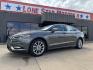2017 GRAY /BLACK FORD FUSION SE SE (3FA6P0HD2HR) with an 1.5L engine, 6-Speed Automatic transmission, located at 5900 E. Lancaster Ave., Fort Worth, TX, 76112, (817) 457-5456, 0.000000, 0.000000 - The 2017 Ford Fusion SE offers a perfect mix of style and efficiency with its 1.5L 4-cylinder engine and 6-speed automatic transmission, delivering 22 city / 34 highway MPG. This FWD sedan seats five comfortably and comes equipped with backup camera, phone connectivity, alloy wheels, and dual climat - Photo#0