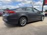 2017 GRAY /BLACK FORD FUSION SE SE (3FA6P0HD2HR) with an 1.5L engine, 6-Speed Automatic transmission, located at 5900 E. Lancaster Ave., Fort Worth, TX, 76112, (817) 457-5456, 0.000000, 0.000000 - The 2017 Ford Fusion SE offers a perfect mix of style and efficiency with its 1.5L 4-cylinder engine and 6-speed automatic transmission, delivering 22 city / 34 highway MPG. This FWD sedan seats five comfortably and comes equipped with backup camera, phone connectivity, alloy wheels, and dual climat - Photo#3
