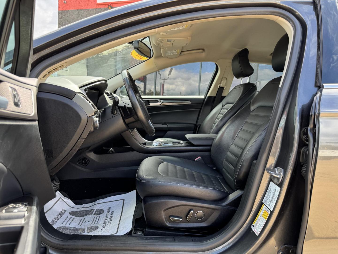 2017 GRAY /BLACK FORD FUSION SE SE (3FA6P0HD2HR) with an 1.5L engine, 6-Speed Automatic transmission, located at 5900 E. Lancaster Ave., Fort Worth, TX, 76112, (817) 457-5456, 0.000000, 0.000000 - The 2017 Ford Fusion SE offers a perfect mix of style and efficiency with its 1.5L 4-cylinder engine and 6-speed automatic transmission, delivering 22 city / 34 highway MPG. This FWD sedan seats five comfortably and comes equipped with backup camera, phone connectivity, alloy wheels, and dual climat - Photo#8